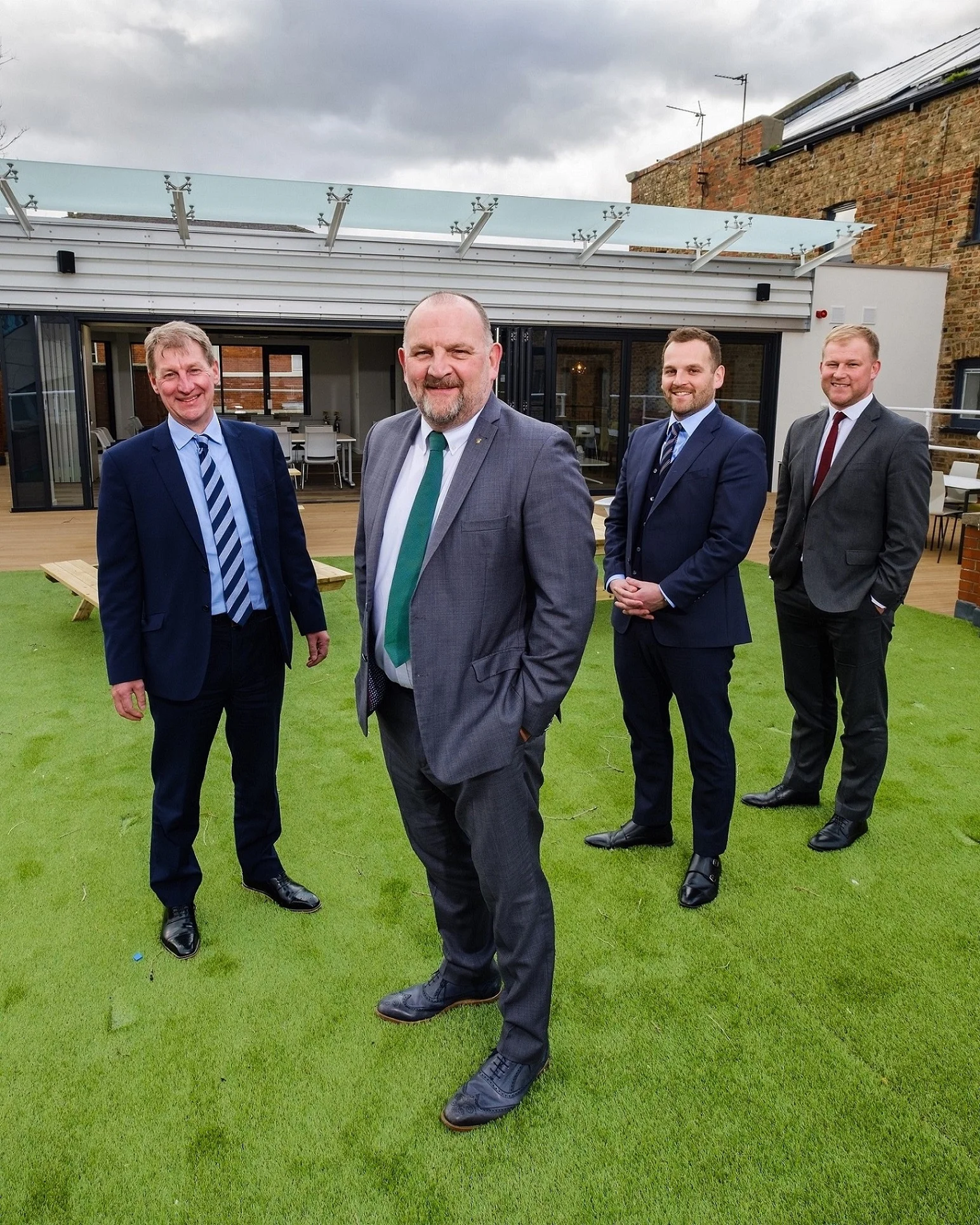 From left, Wykeland’s David Donkin, Hugh Rice’s Mike Rice and James Rice, and Wykeland’s John Gouldthorp outside the new rooftoop “pod” - a key feature of Hugh Rice’s new Central Support Unit.