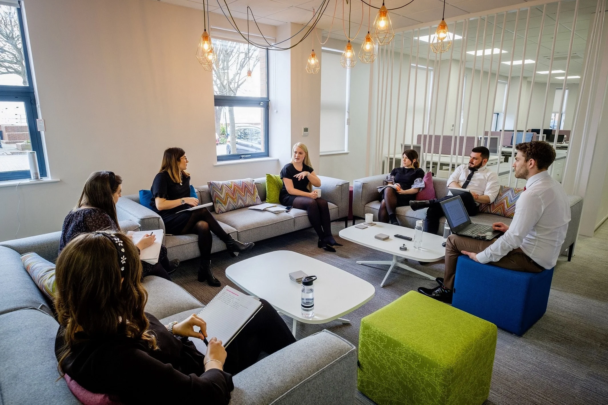 Hugh Rice staff hold a meeting in one of the breakout areas in their new Fruit Market offices. The building has been completely remodelled and refurbished, to create a bright, contemporary and inspirational space, reflecting the quality of Hugh Rice’s retail environments.