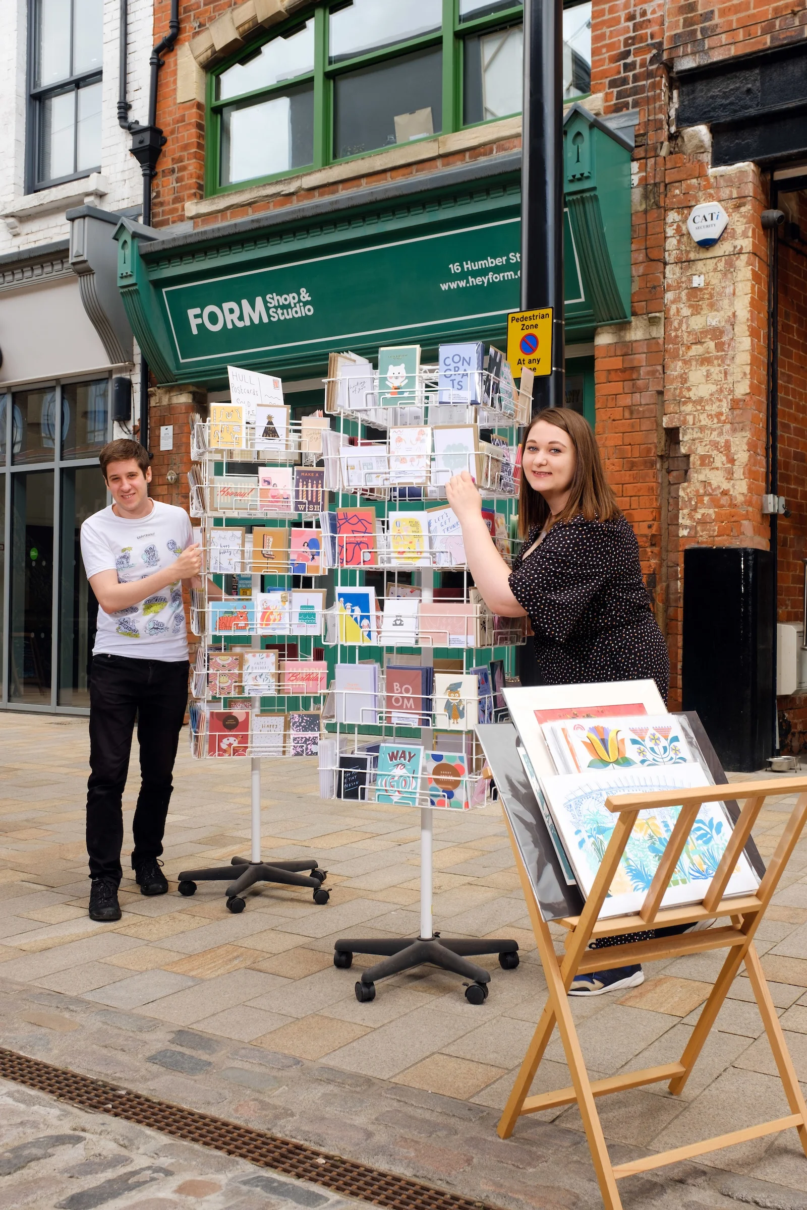 Joseph and Alice outside their current shop on Humber Street.