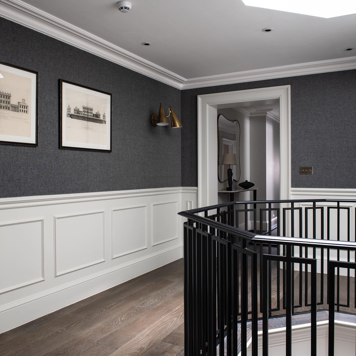 Dark textured walls you want to touch, contrasted with traditional painted panelling to create a tailored look for this London townhouse landing &amp; home office.  Interiors @schillerbeynoninteriors Photograpy @jodystewartphotography Architecture @s