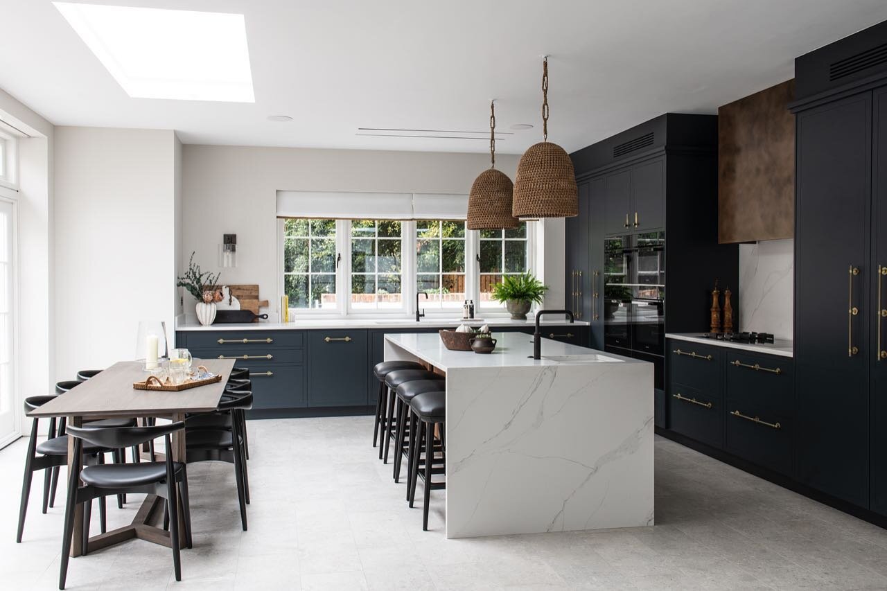This architecturally designed space benefits from volume and natural light - which offers a fabulous contrast to the darker tones we carefully selected for the kitchen cabinetry (Farrow &amp; Ball Railings 🖤). There is much we love about this space,