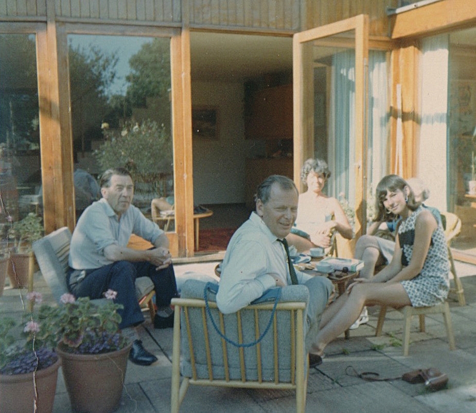 Mr Reid far left, Mrs Reid far right, and Ingrid sporting white lipstick and hoop earrings