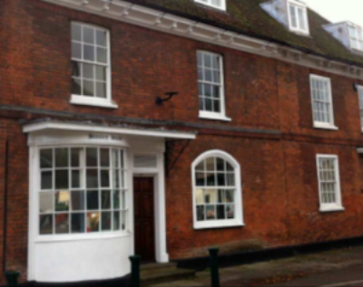 The London Steak House, Epsom had a stylish bright green decor and open-brick walls