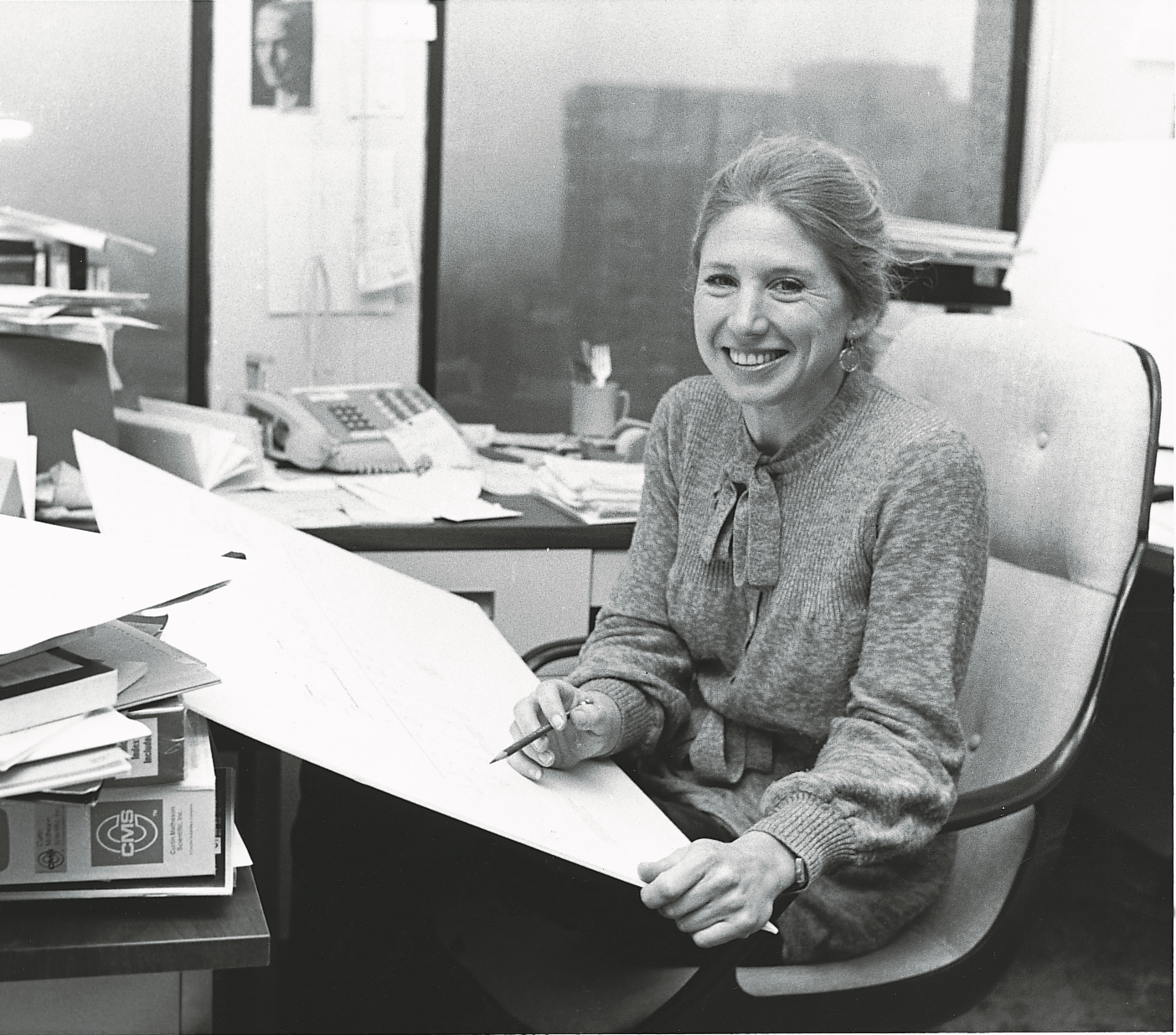 Nancy at her desk.png