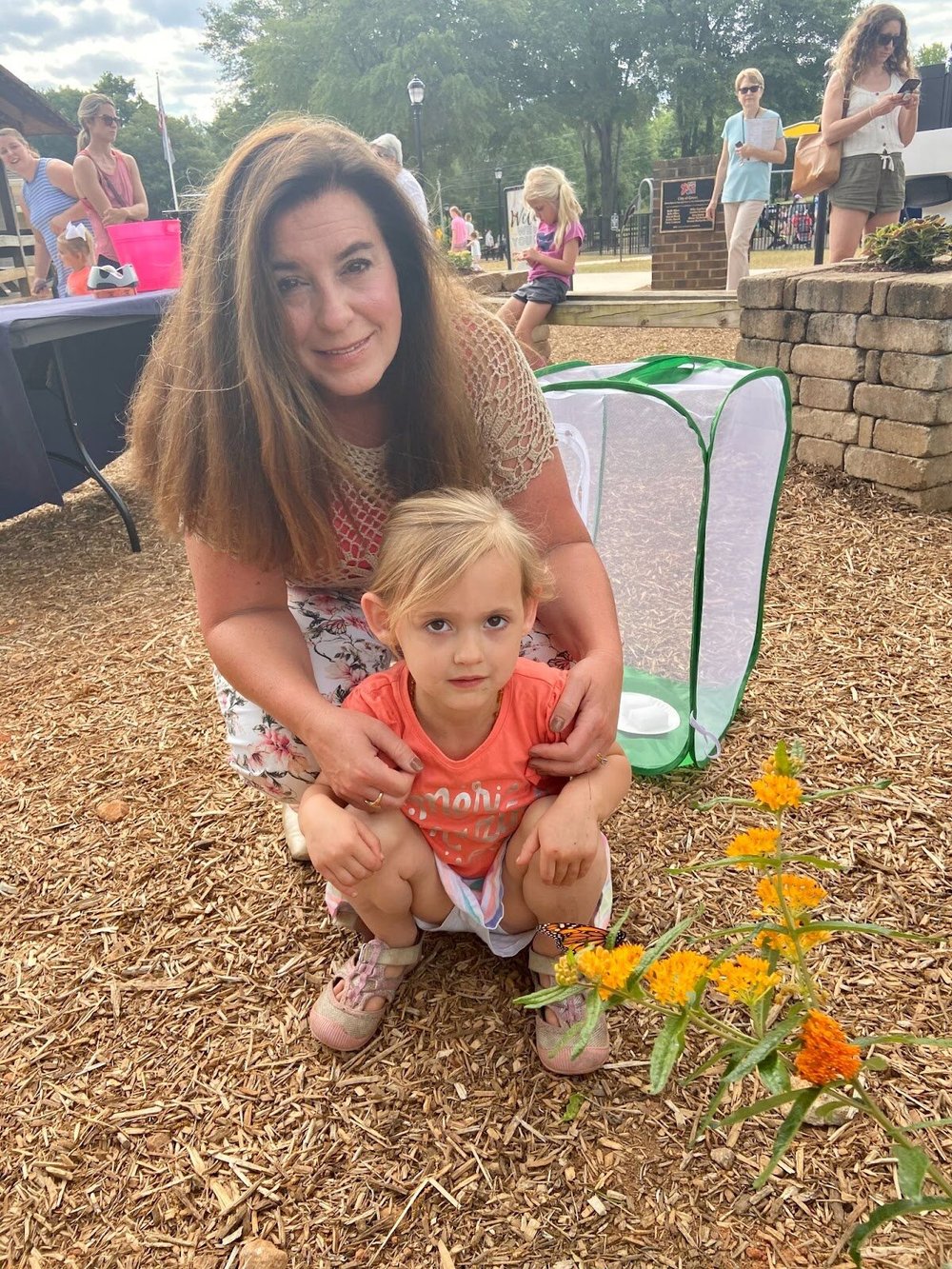 Kelly Long and her granddaughter at the City of Greer’s new Kids Planet butterfly garden at Century Park