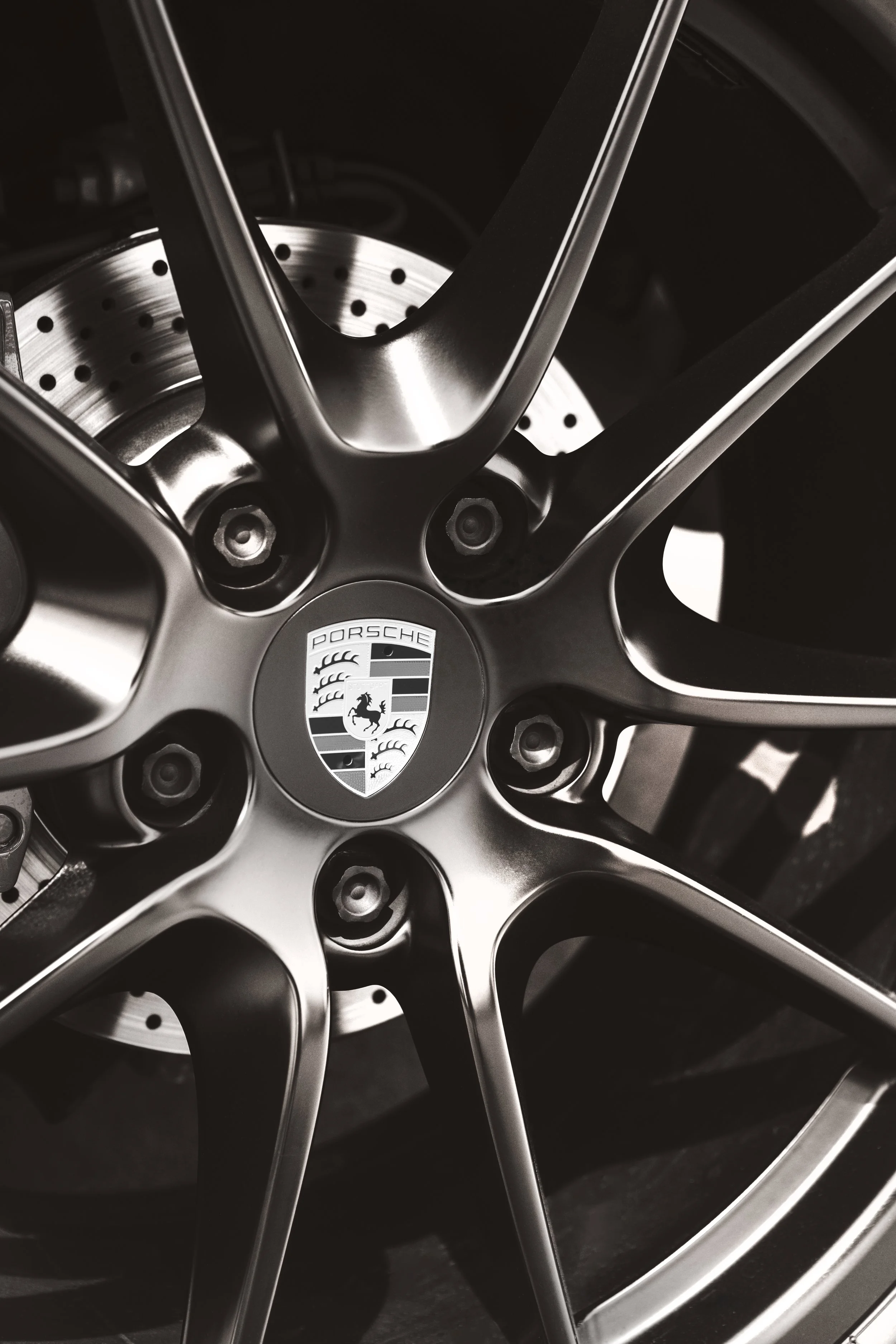 Elegance in Motion: Porsche Wheel Art Piece - 24" x 36" metallic print