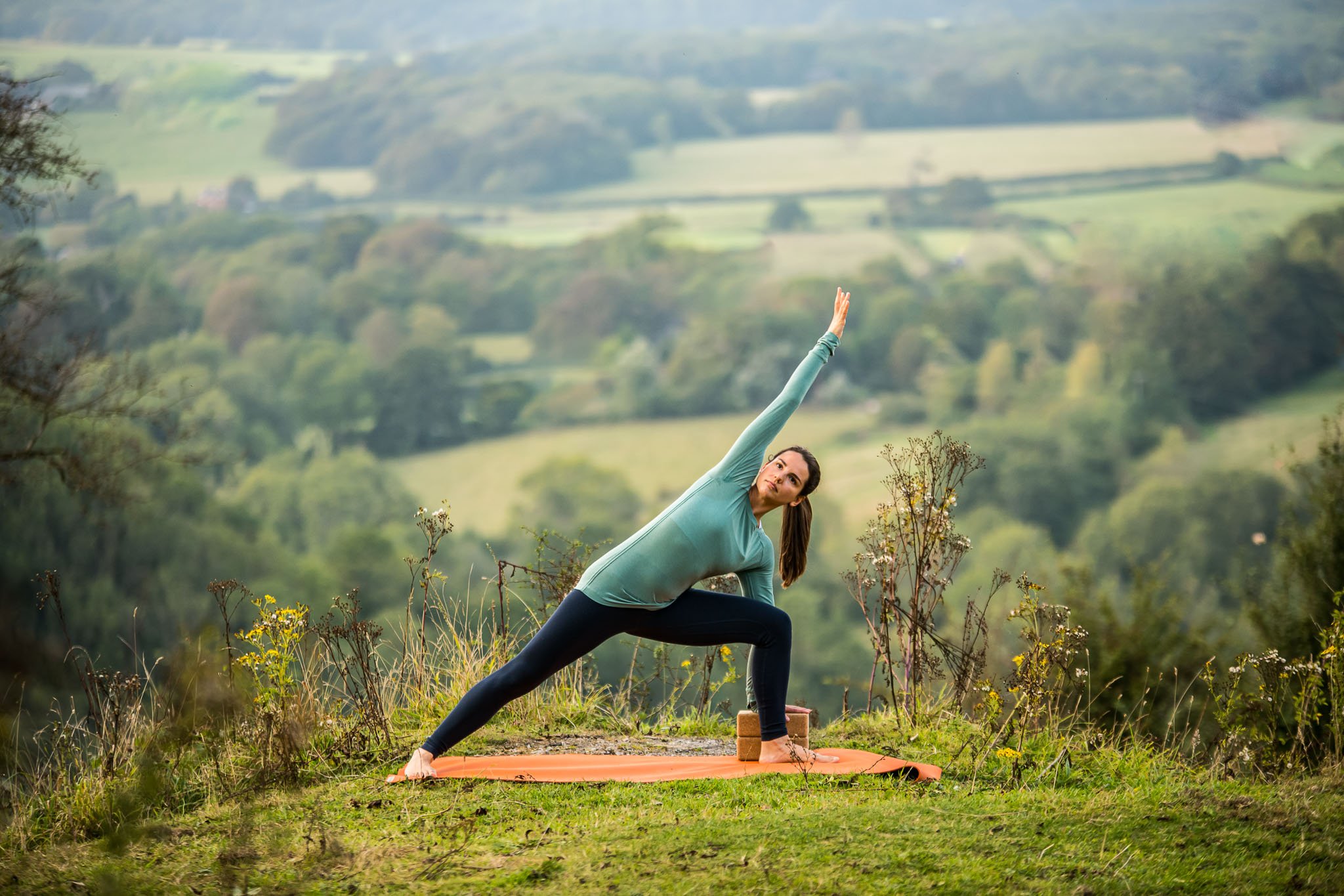 Outdoor brand portrait photo shoot with Yoga teacher in Sussex countryside