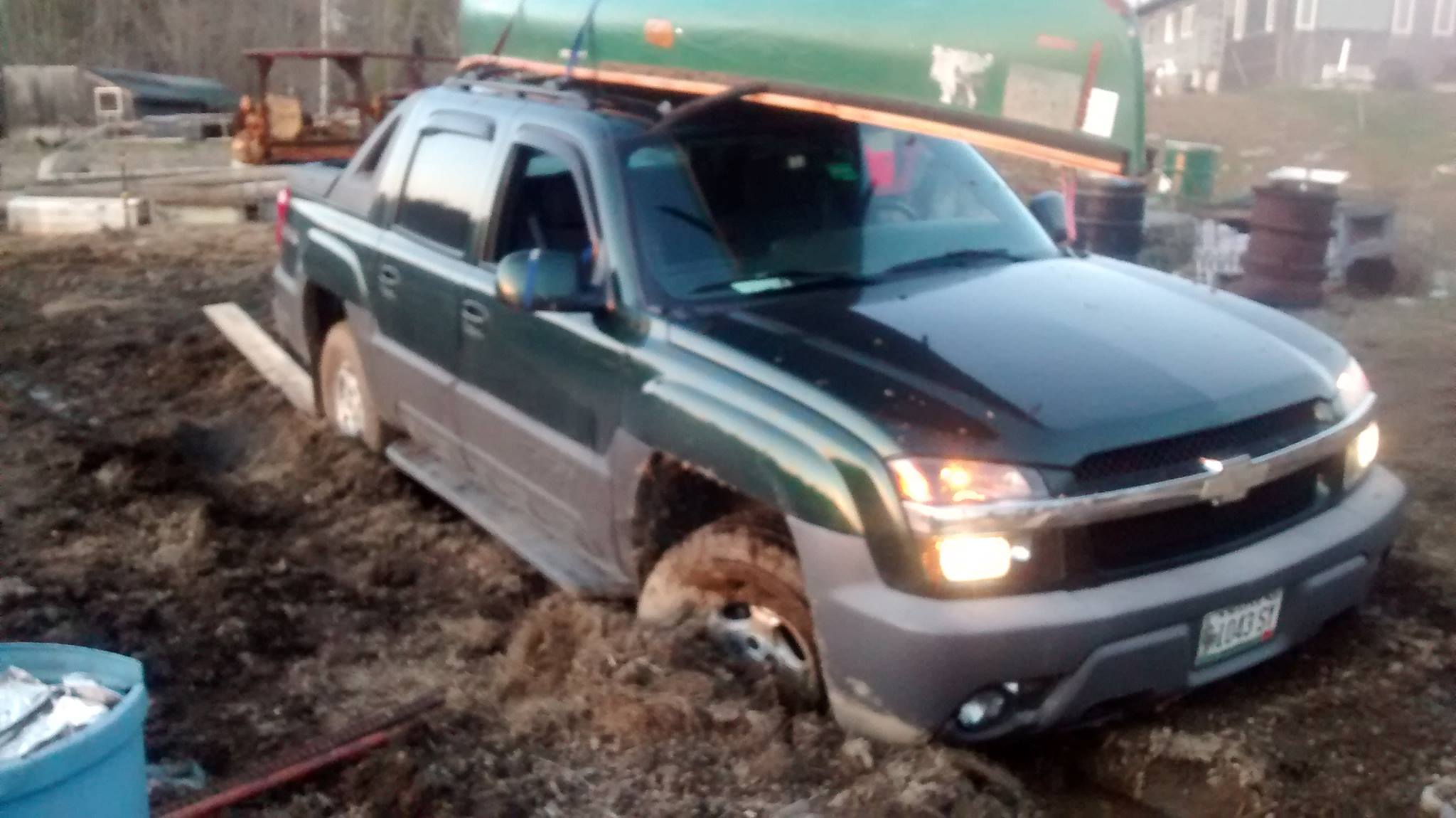 Truck stuck in mud and manure