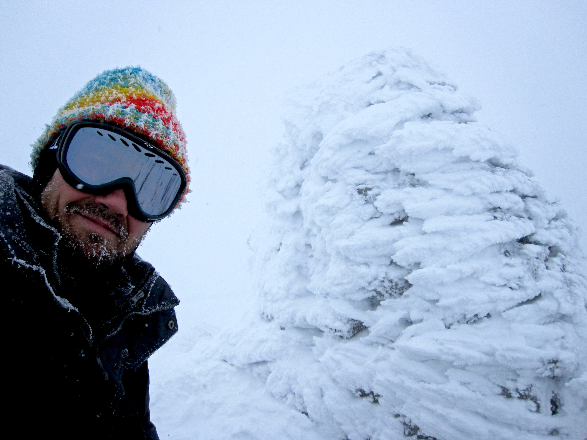 Mount Washington cairn with rime ice.