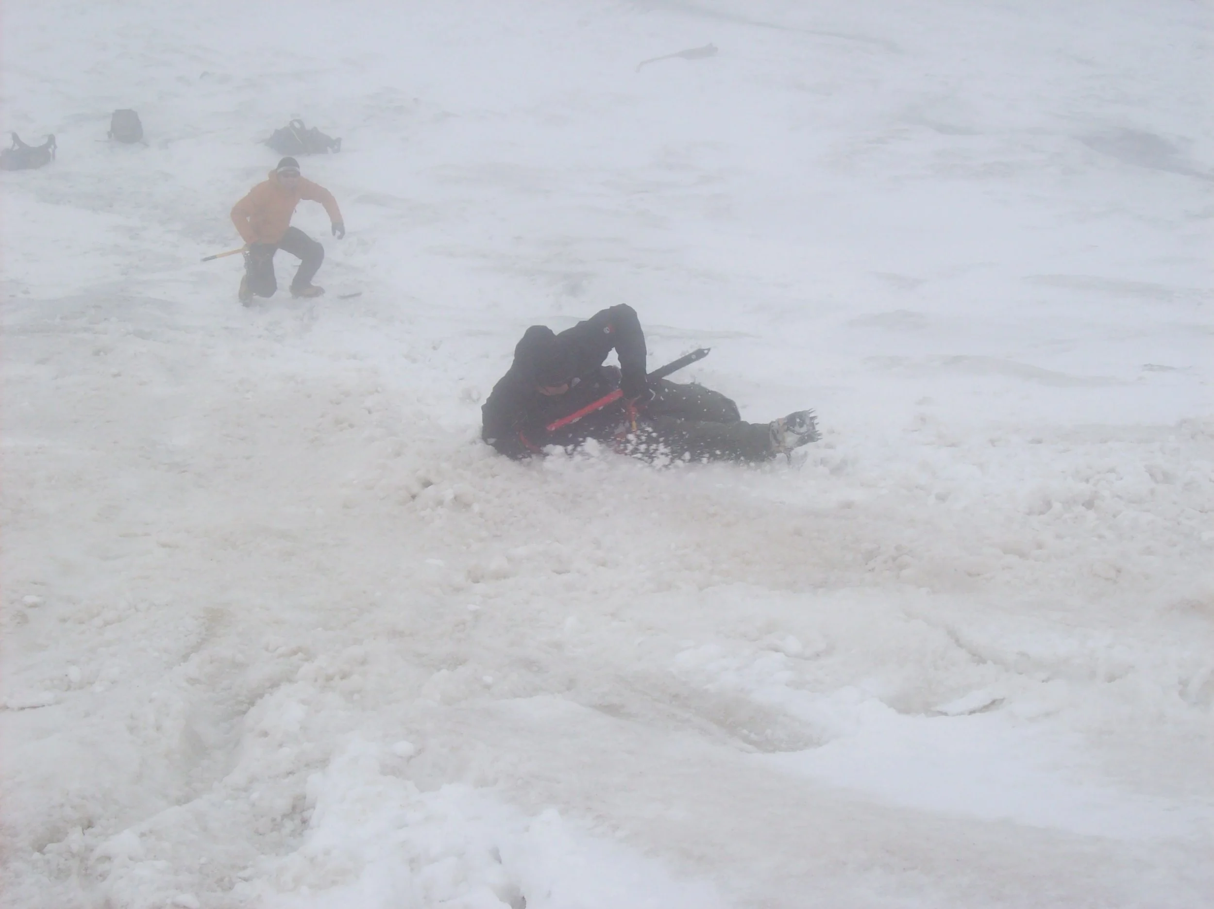 Practicing self arresting with our ice axes