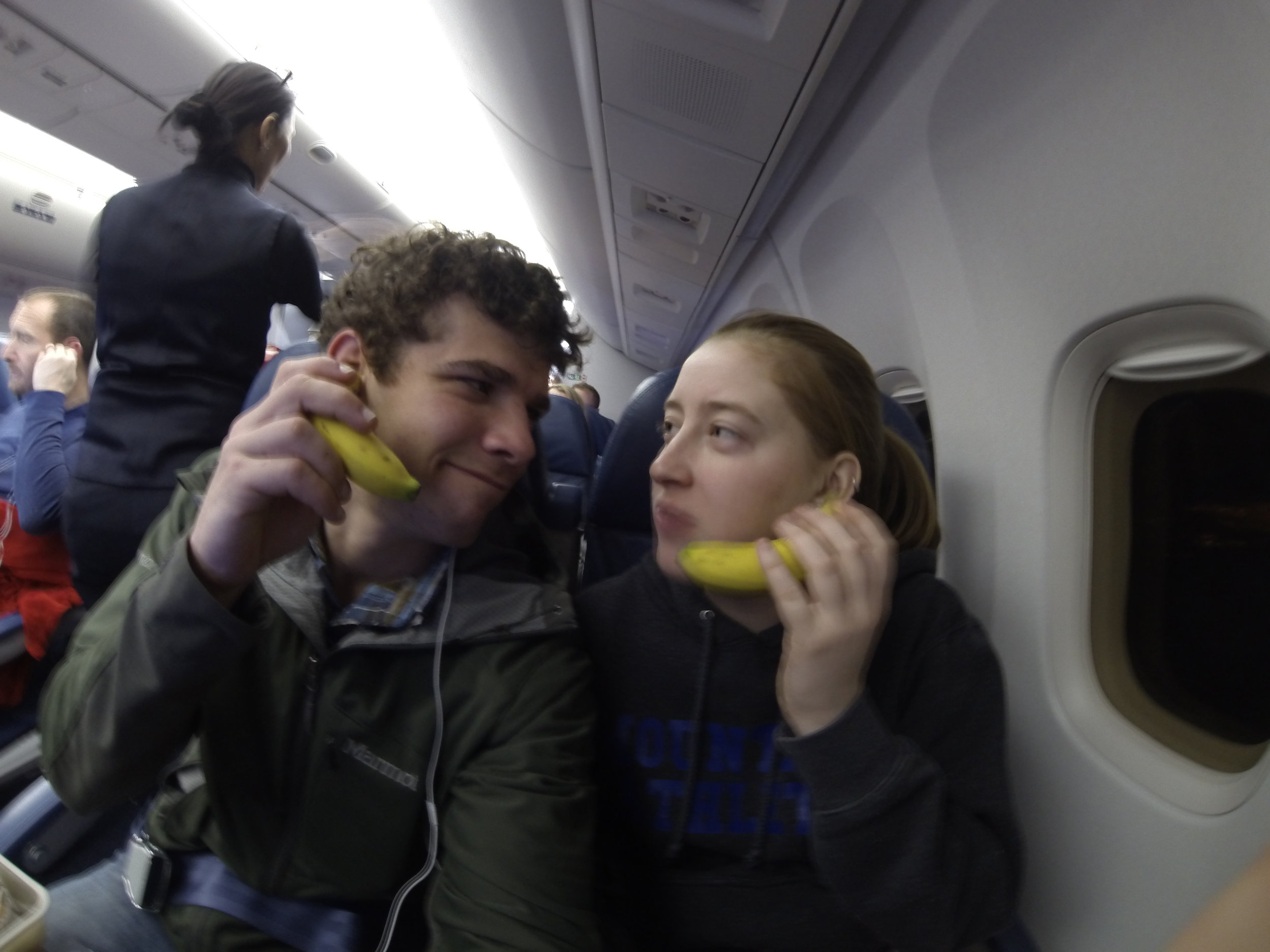 Playing with our food on our flight.
