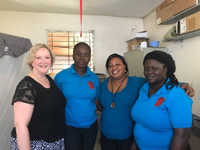 Dr. Wickstrom with lab technicians Marthe and Mirlande (in the polo shirts) and Rosena, the director of Maison de Naissance.