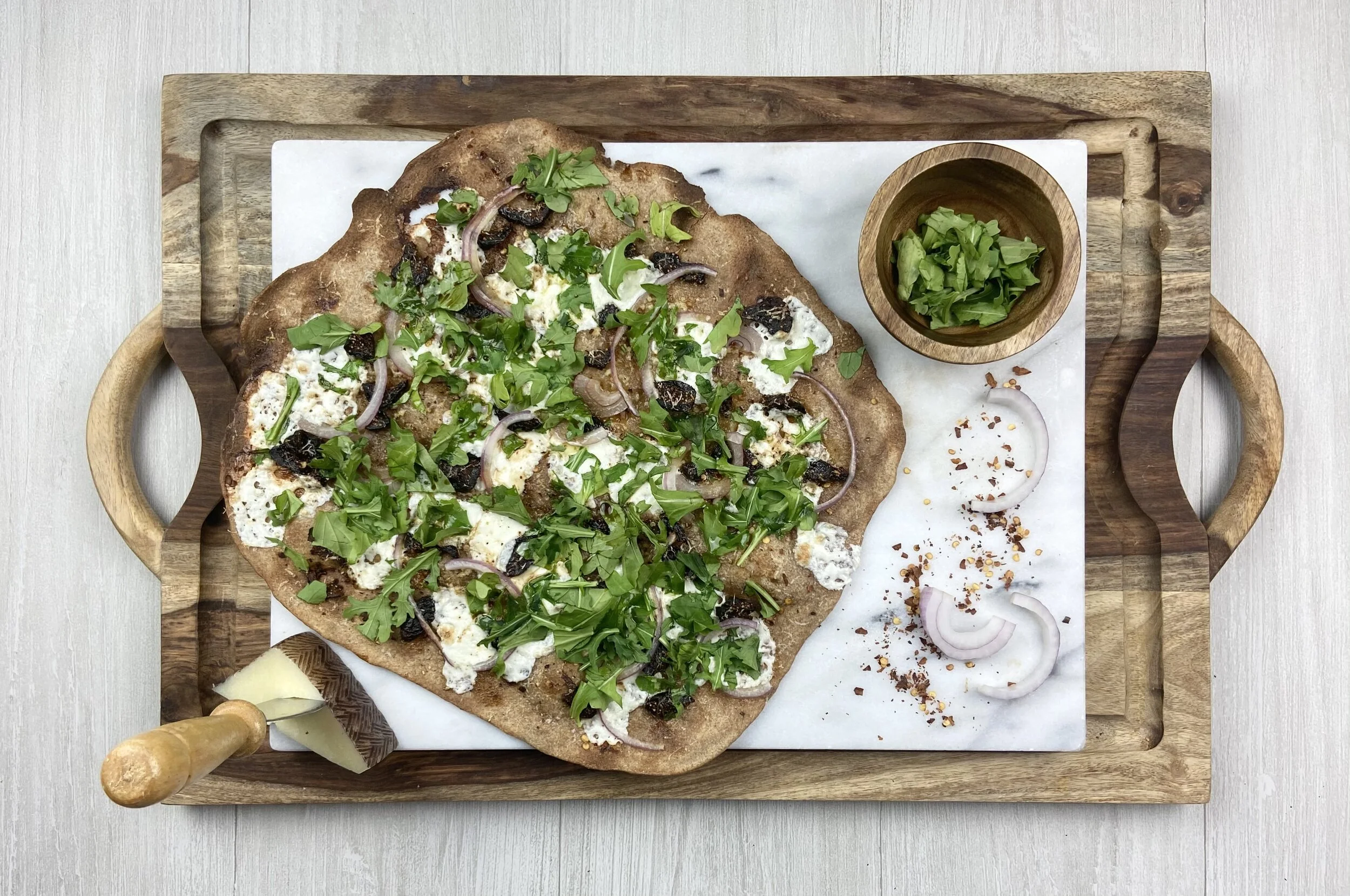 Whole Wheat Cracker-Crust Pizza with Figs, Manchego, &amp; Arugula
