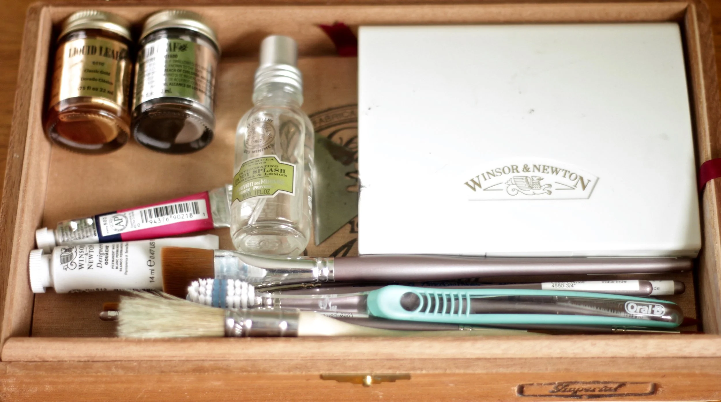 I keep the majority of my stash in an old cigar box. I've meant for ages to pick up some balsa wood & make little compartments for everything. Maybe I'll do that this winter.