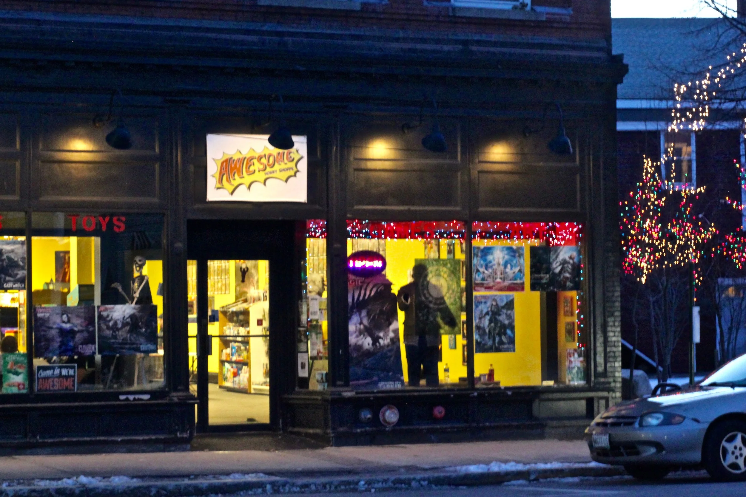 The exterior of Awesome Hobby Shoppe. That's a statue of Jason in the window.