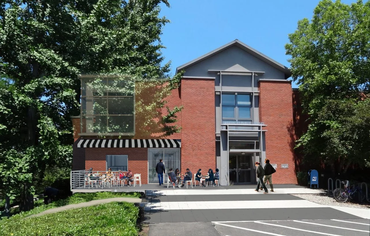 A modest outdoor café terrace enhances the entrance on the Levitt Pavilion side of the building.