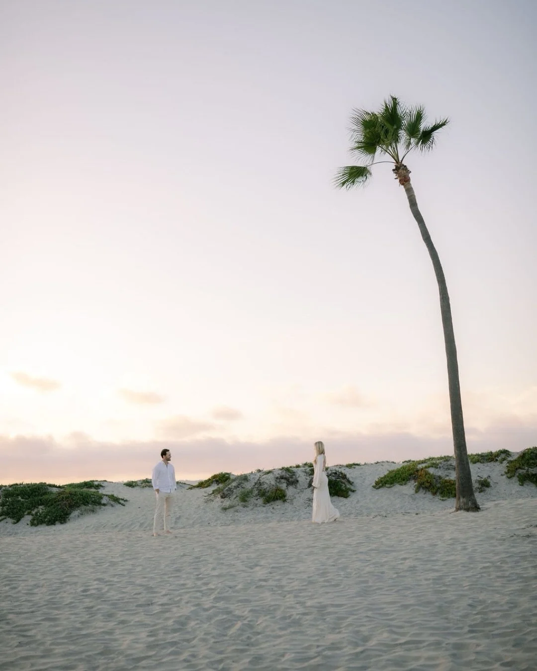 Love on the beach. Can&rsquo;t wait to capture these two beautiful souls get married with my lovely friend @blissevent_korie doing her magic. ✨ @julialovaas . Much more to come from this session🤍
.
.
.
.
.
#sandiegoweddingplanner  #sandiegoweddingph