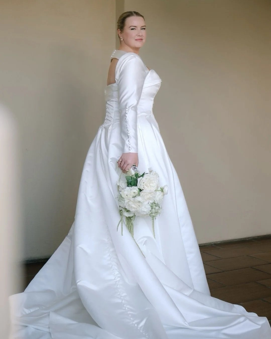 A day that moved from the reverence of a Catholic ceremony to the romance of a candlelit celebration at Estancia&mdash;and ended with the most joy-filled celebration. 🤍

Classic black and white, cascading florals, a vintage getaway car, and so many 