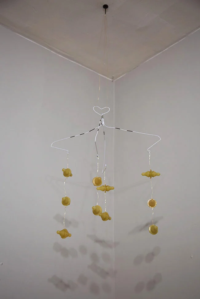 Unbridled (mobile) , 2016-2017 wire hangers, enamel, wire, thread, silicone bottle nipples