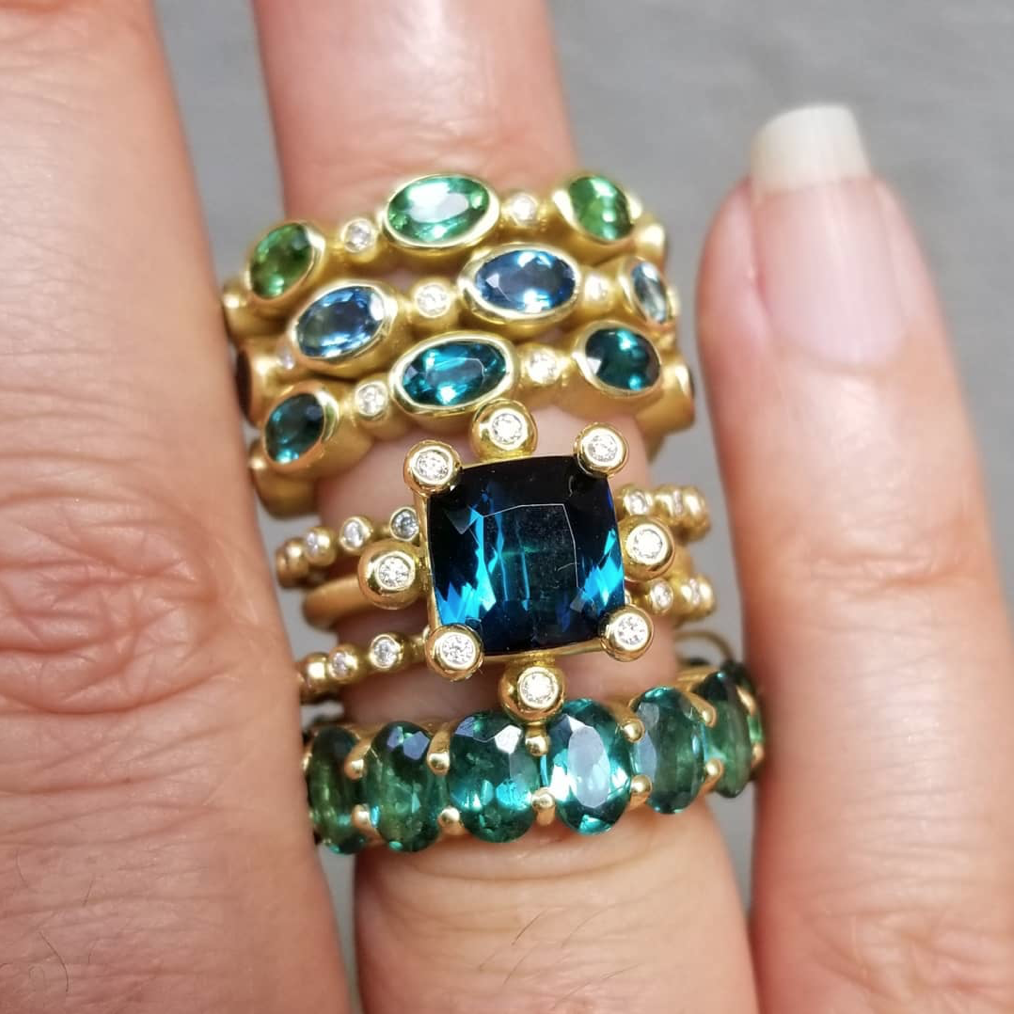Suzy_Landa_green_tourmaline_rings.png