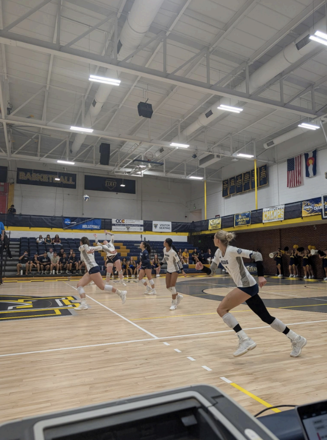 Women’s Volleyball game in action captured by Maggie Ridge