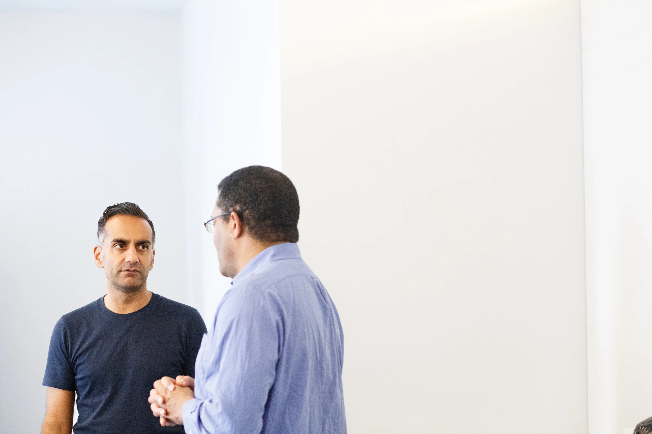 Pritpal S Tamber (facing) speaking with Tony Iton, Senior VP for Healthy Communities at The California Endowment.