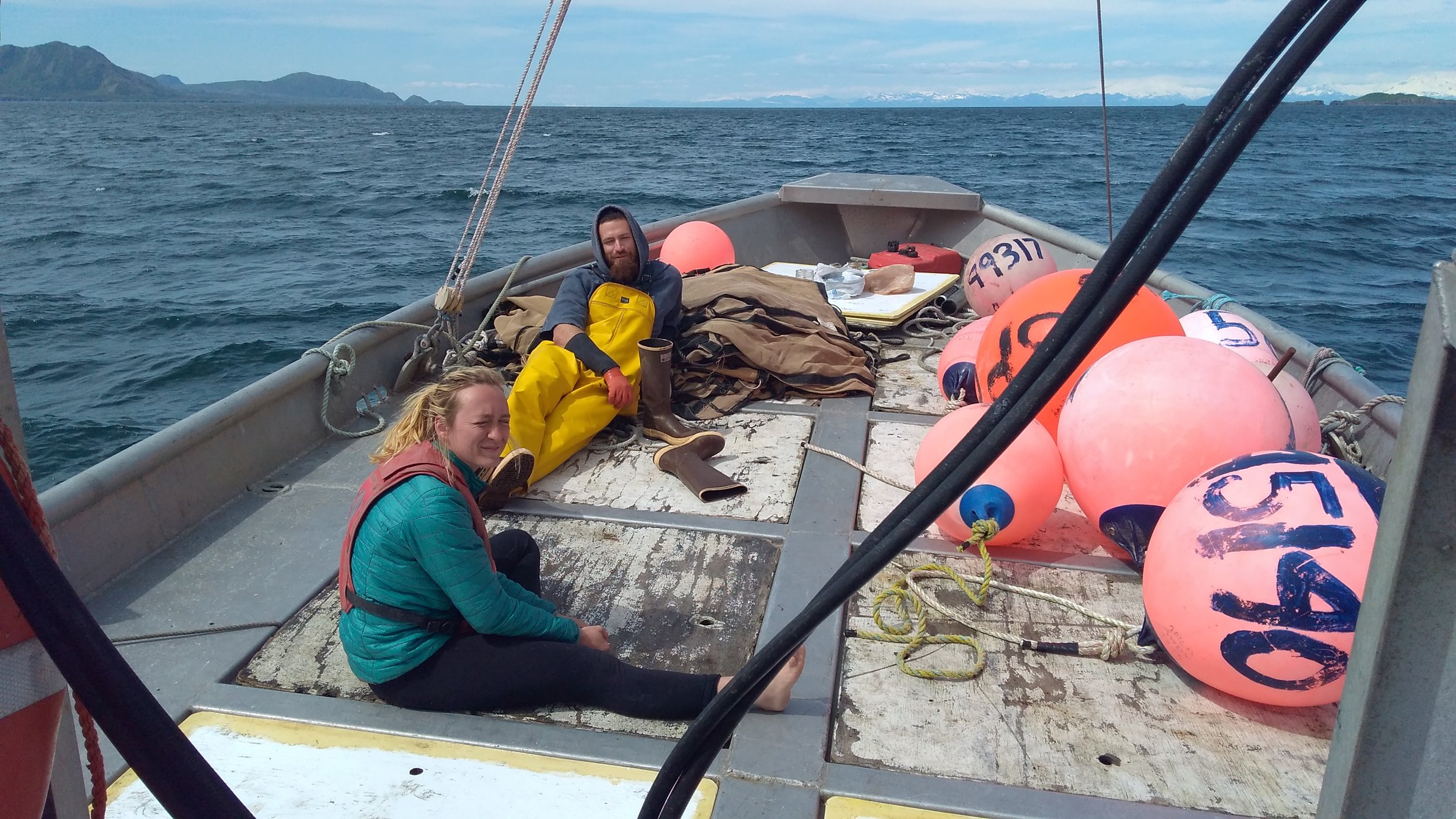 Crew takes a breather while waiting for the tender