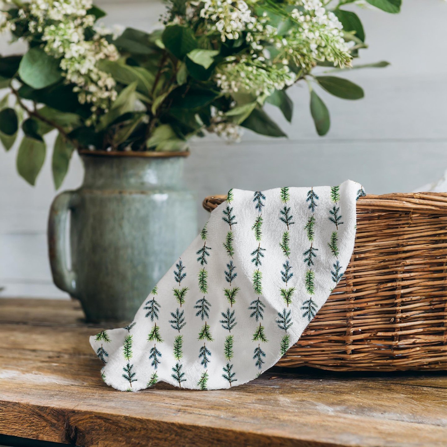 Pine-branches-tea-towel-in-basket.jpg