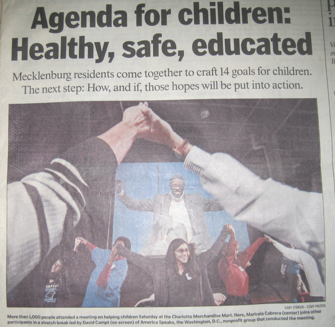 The cover of the Charlotte Sunday paper after a meeting of 1,000 people about children. 