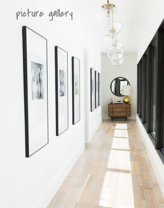 Making a picture gallery is probably the most popular option for hallway décor, but it can also be the most overwhelming. What pictures do you choose? How many do you need? Do you keep the picture frames all the same or change it up? How do you begin to hang them? Firstly, figure out what you want to showcase - artwork, family photos, etc. I personally love a wall of pictures frames that are all different - it adds tons of character to the space. With regards to where to start hanging, find the middle of the wall and just go for it. Hang the pictures straight, at random - it's completely up to you!