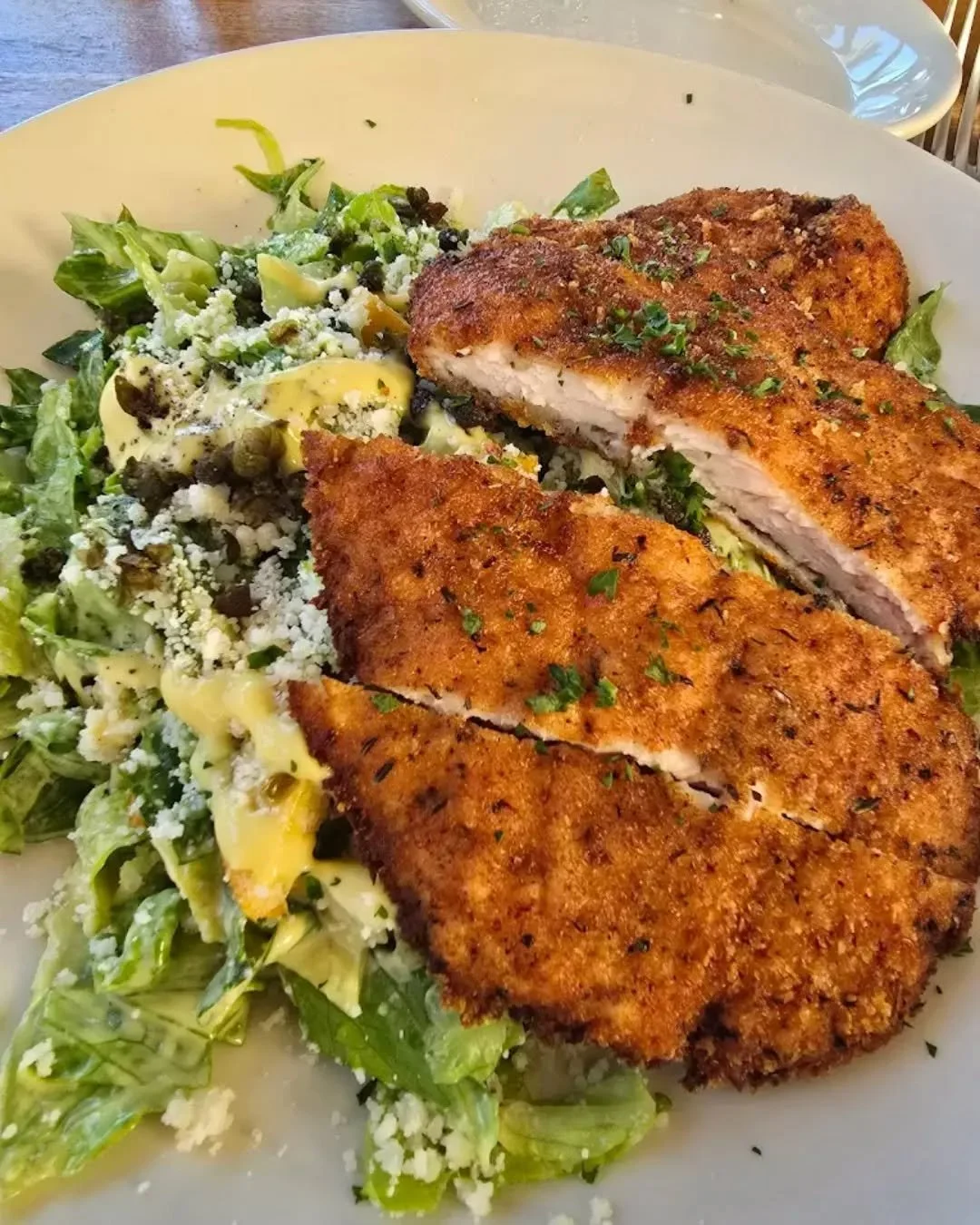 People who don't like salads have clearly never tried ours&nbsp;😌🥗 

Crispy Chicken Caesar&nbsp;| romaine, croutons, fried capers, Reggiano, panko crusted chicken

📸: Rashmi, Google user