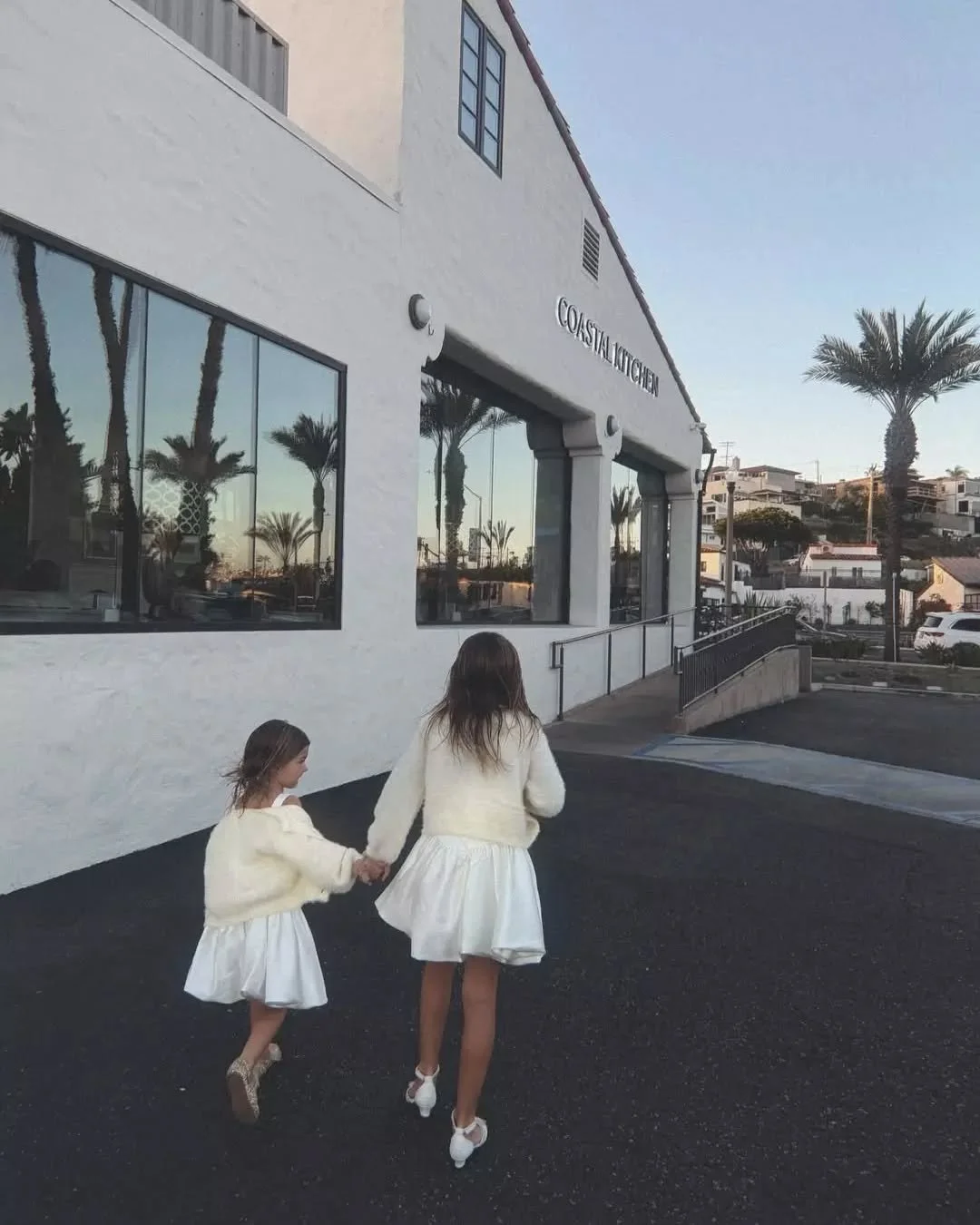 The best walk of the day. 👣✨

We love being the backdrop to your favorite memories. Watching the next generation of coastal foodies grow up at our front door is the best part of the job. 💙

📸: @emilycpe

#CoastalKitchen #FamilyTraditions