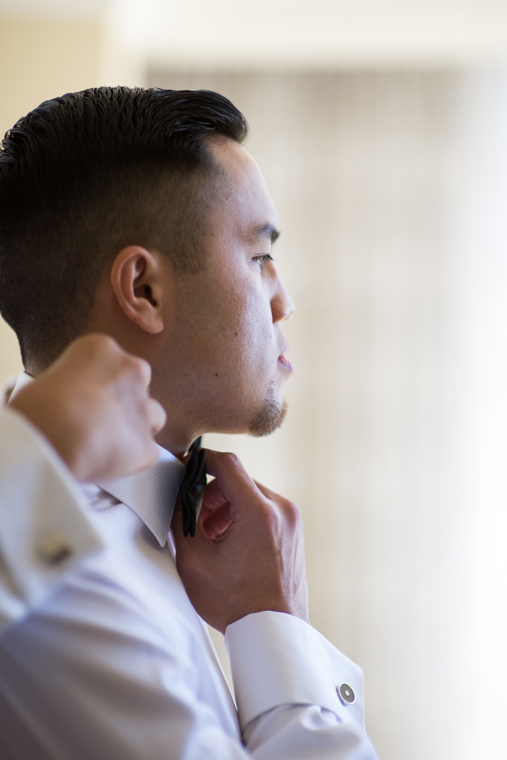Groom gets ready with his best man
