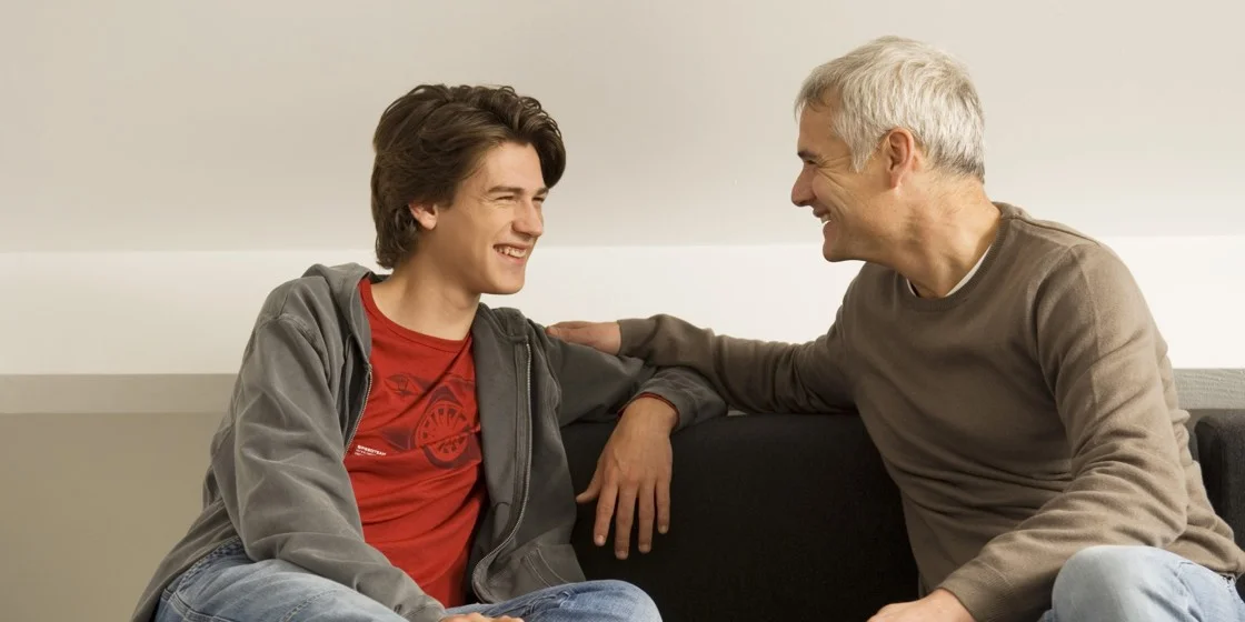 teen boy and dad on couch 1120.jpg
