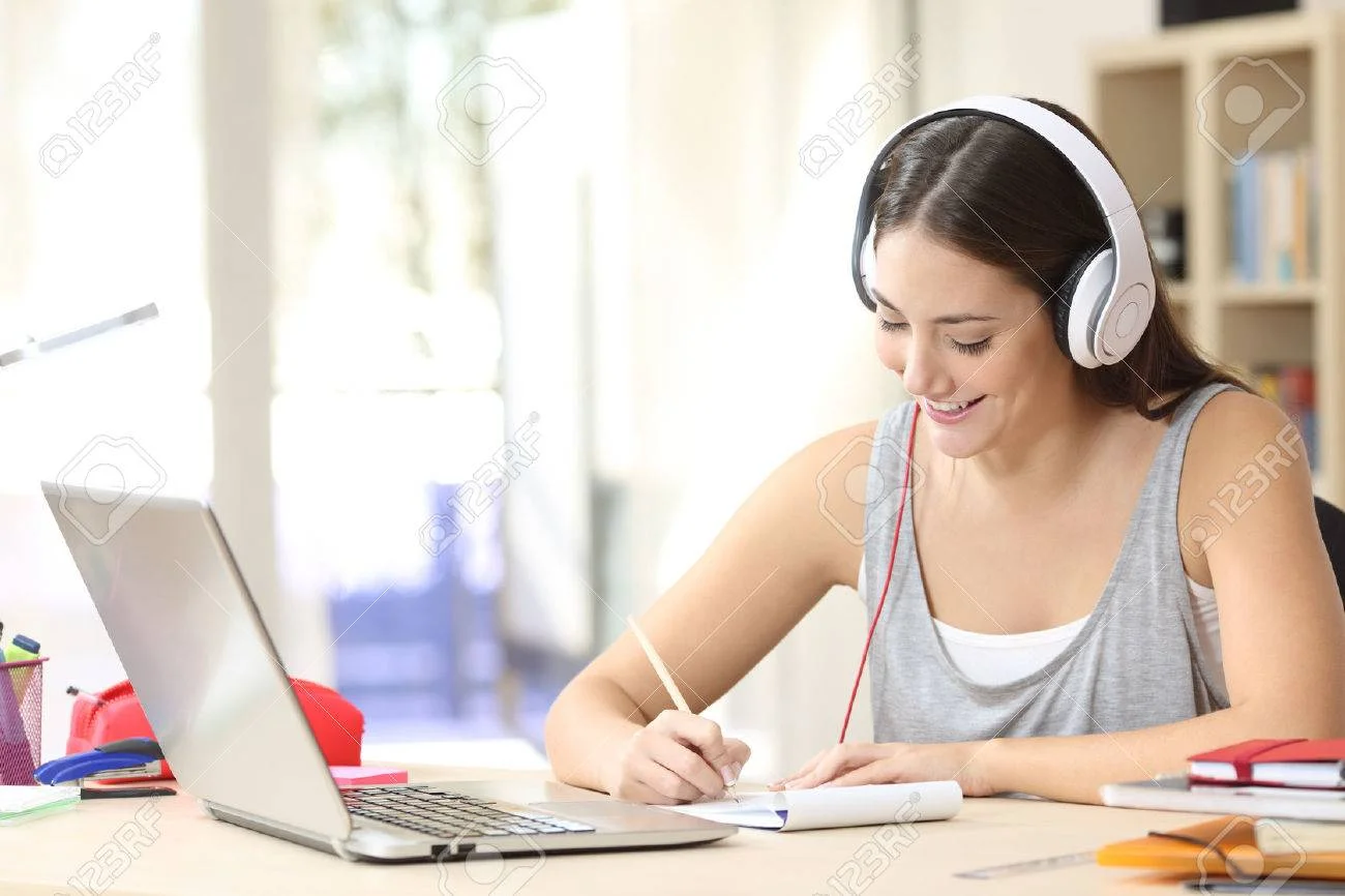 girl-student-with-headphones-and-laptop.jpg