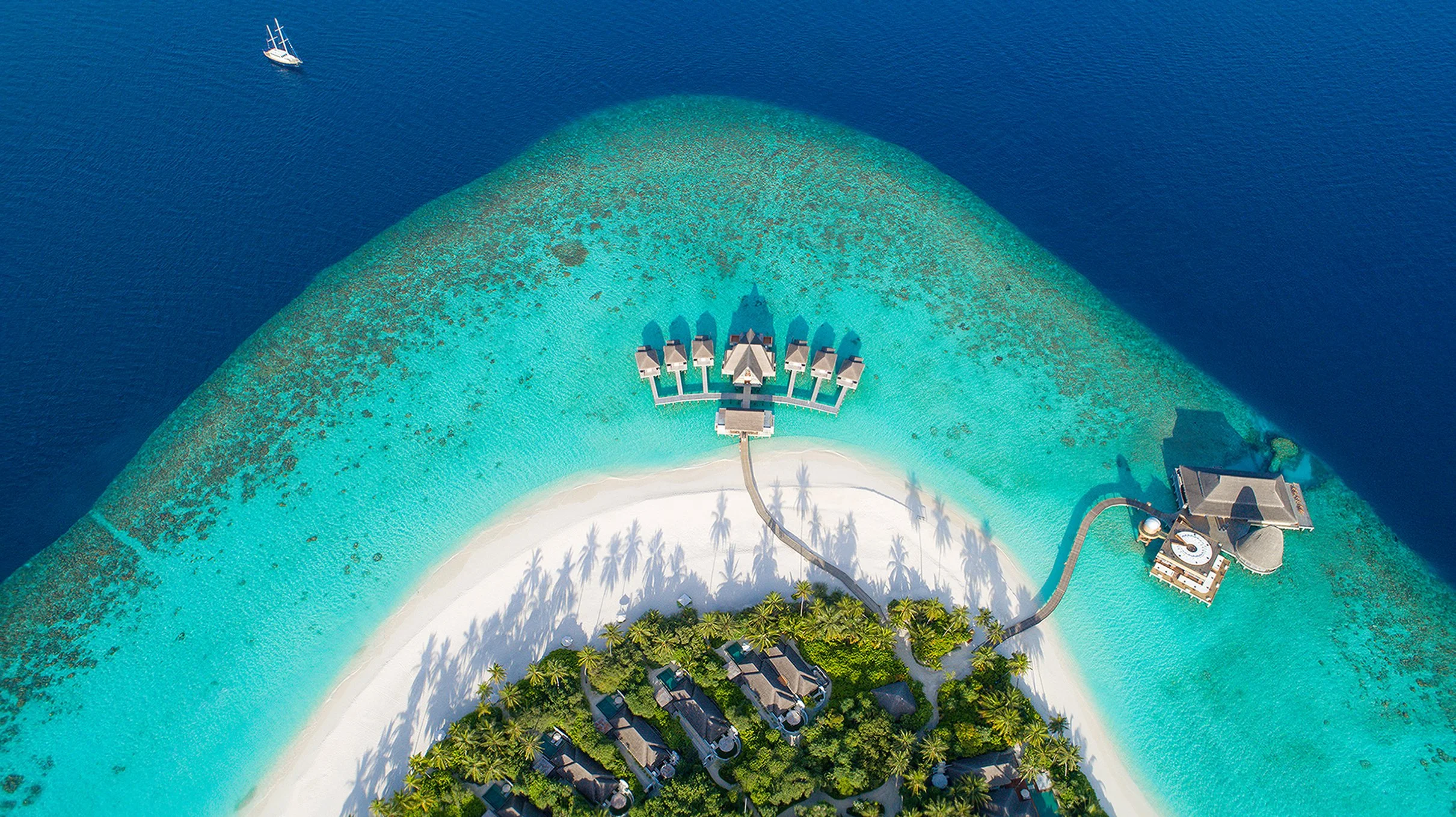 Aerial view of Maldives island resort and villas