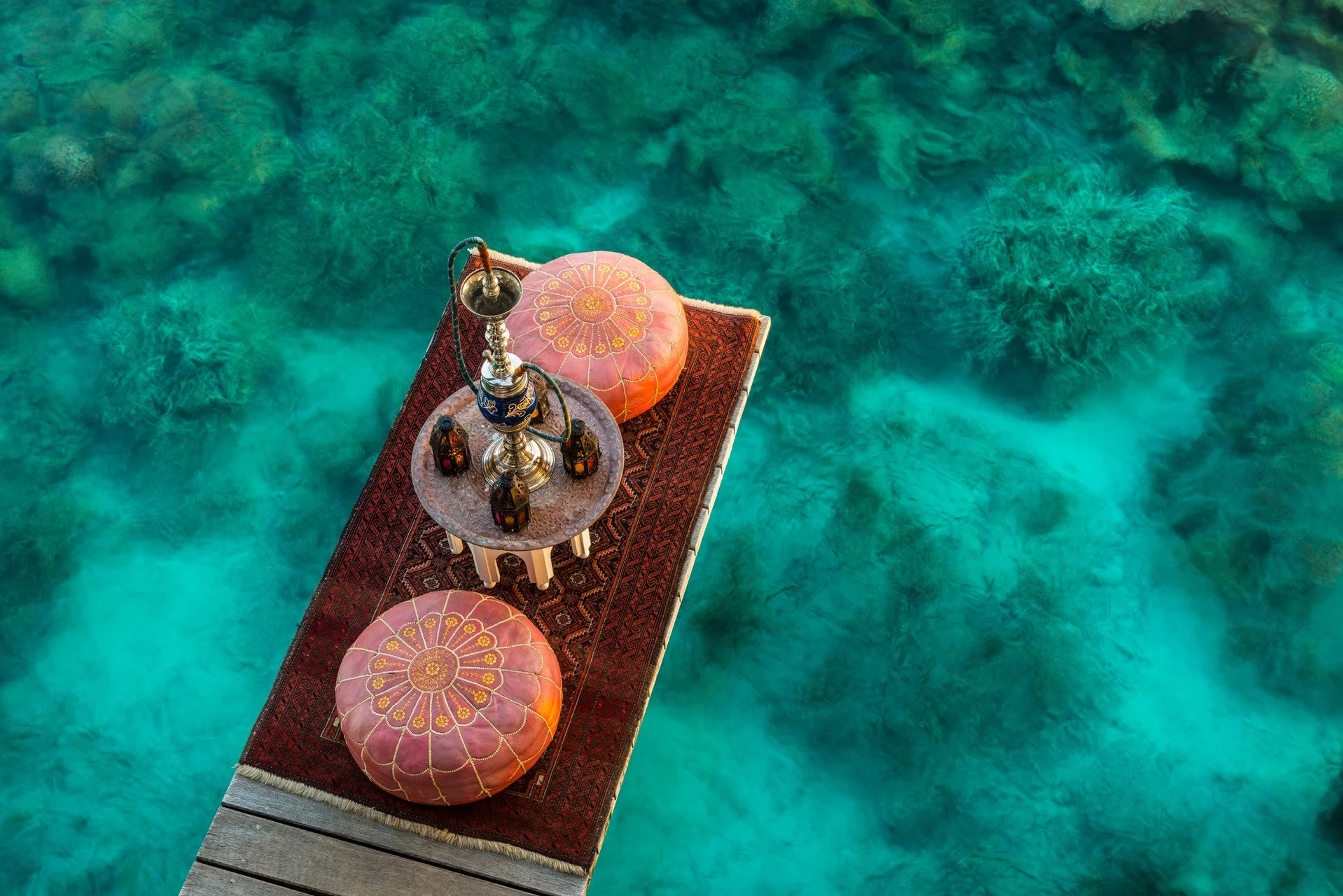 Arabian style table set over a coral lagoon