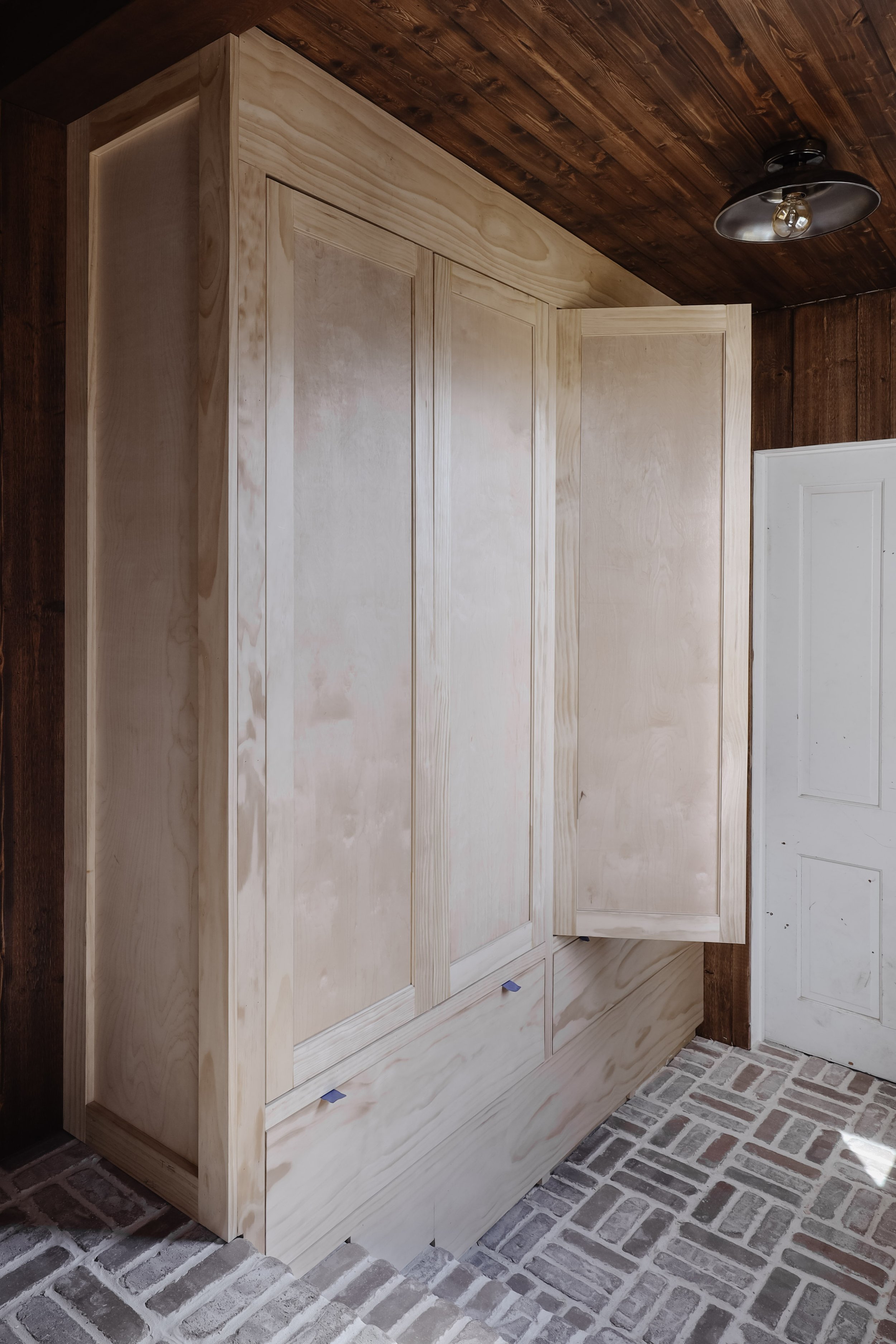 How to build shaker cabinet doors. DIY wood shaker cabinet doors. How to build inset cabinet doors from scratch. DIY tall coat closet and mudroom closet doors | Nadine Stay