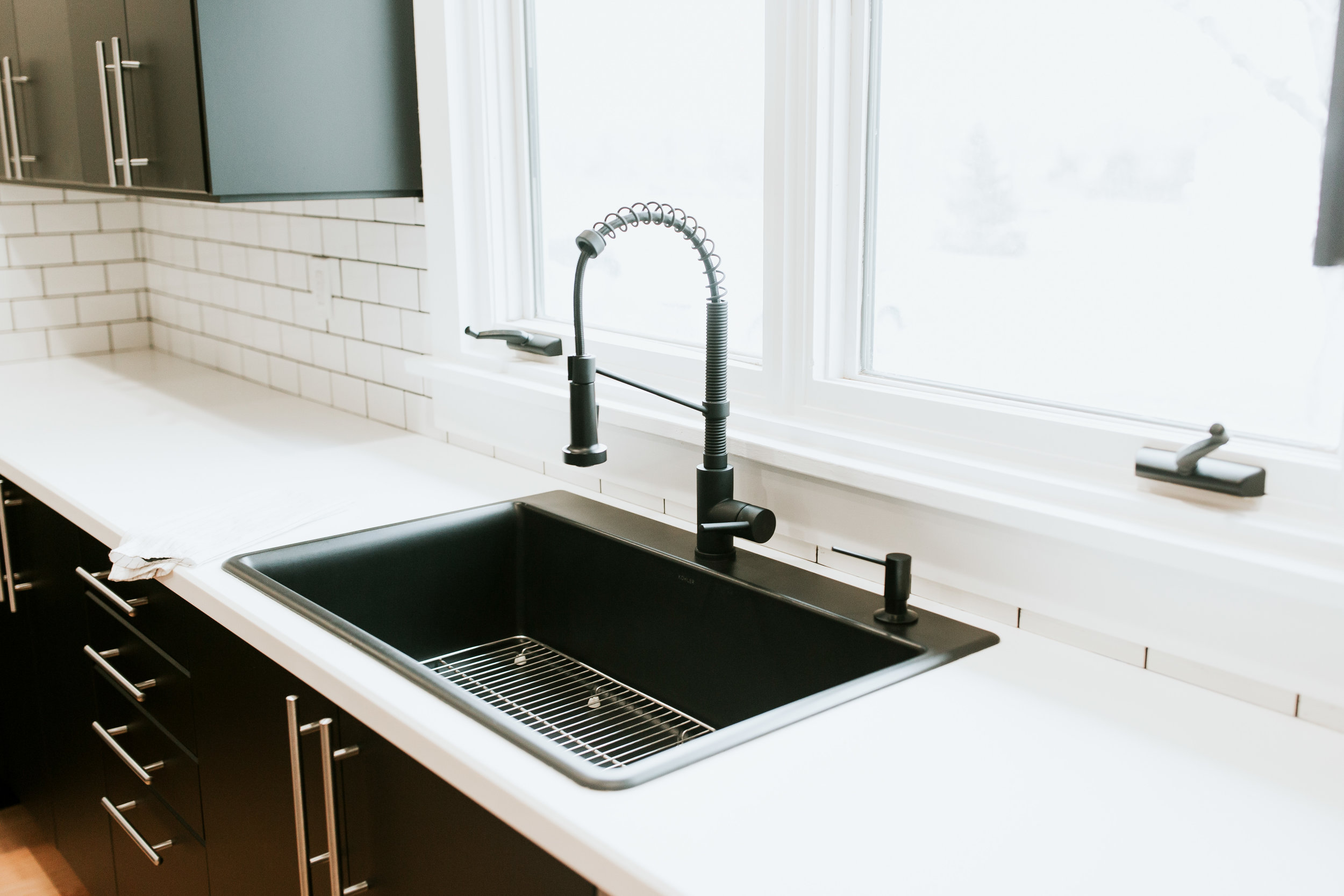 modern kitchen sources - Ikea kungsbacka cabinets, subway tile, black sink, white countertops, black faucet