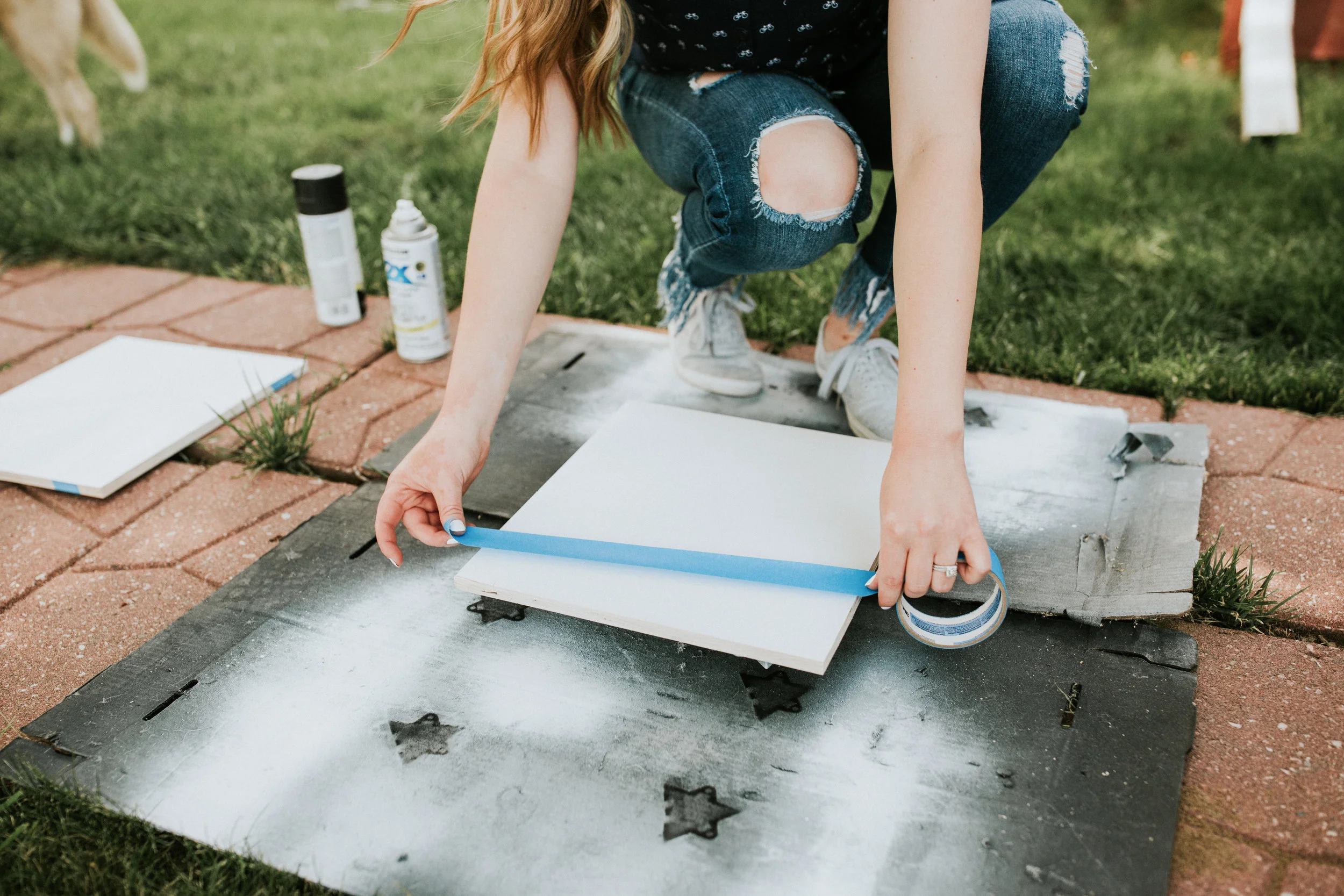 Step 2: Tape the surface - Tape the wall, furniture piece, artwork...whatever it is that you're painting with your desired pattern.