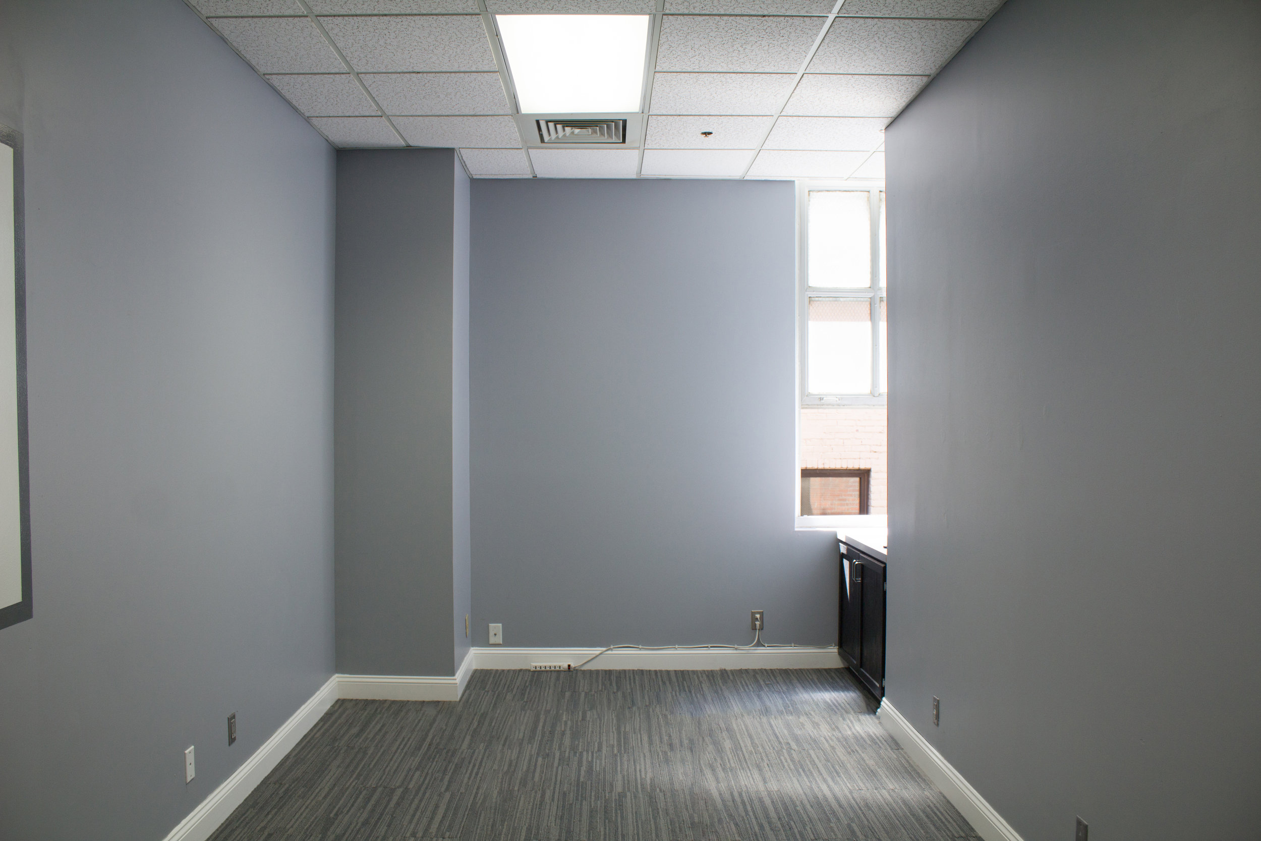 BEFORE - snapped this photo of our studio space the day we signed the lease! We have lots of work ahead of us!