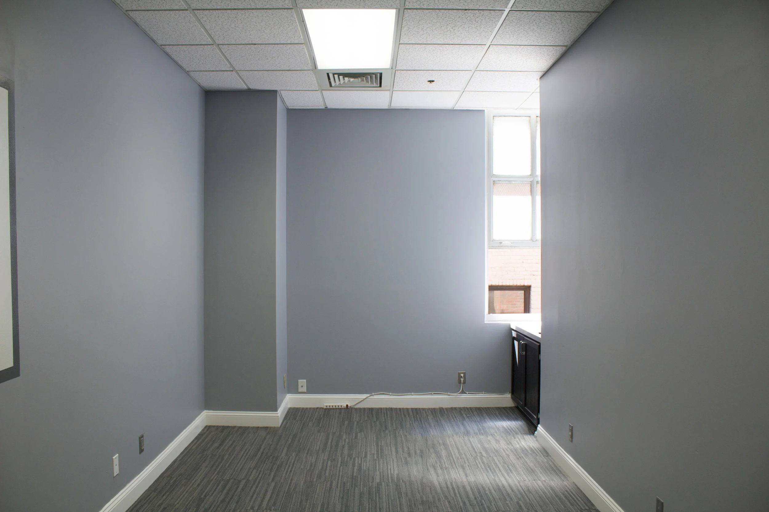 BEFORE - snapped this photo of our studio space the day we signed the lease! We have lots of work ahead of us!