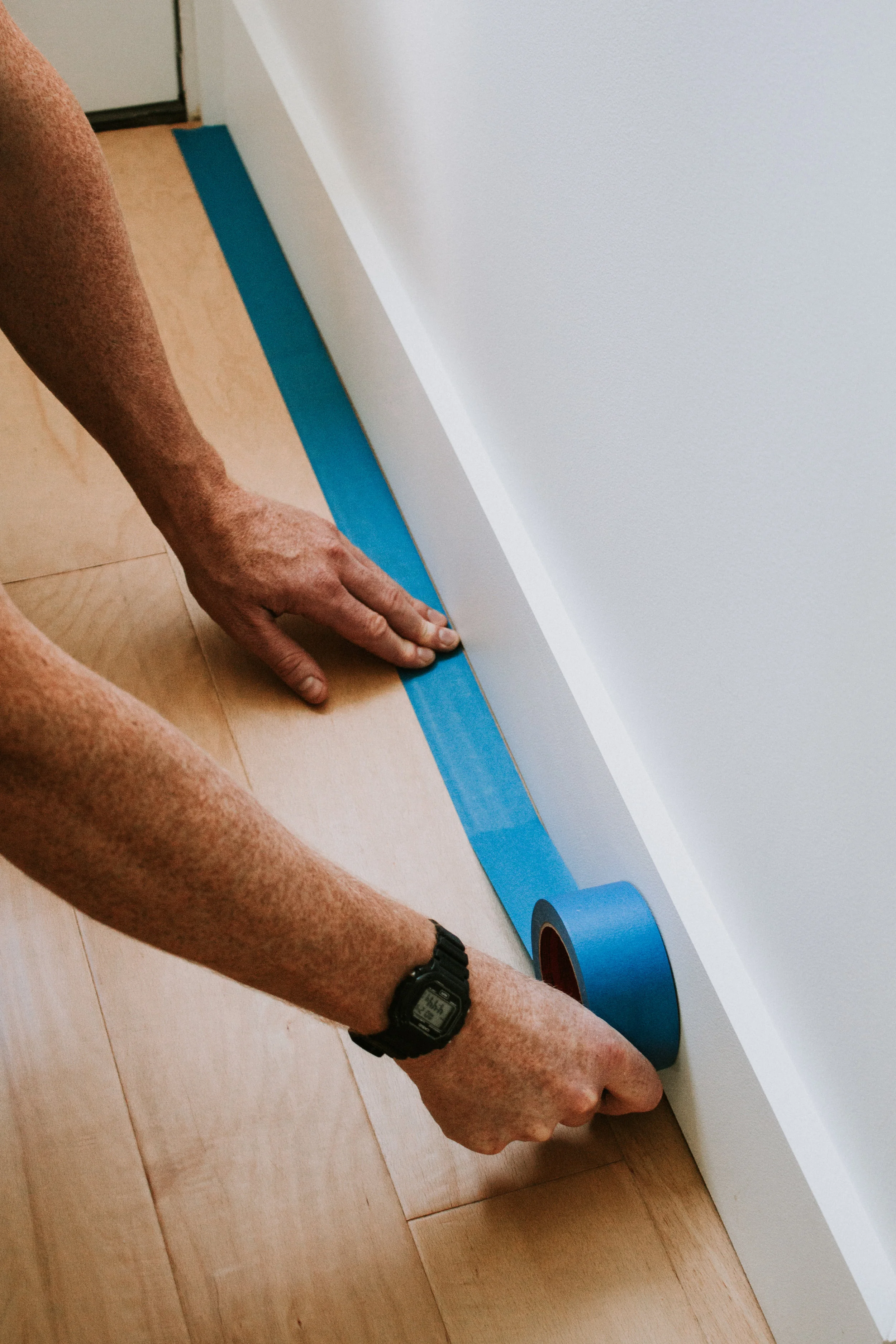 How to Install Floor Trim Like the Professionals - How to cut trim, nail it on the wall, and fill in imperfections. How to fix gaps in floor trim.  Nadine Stay