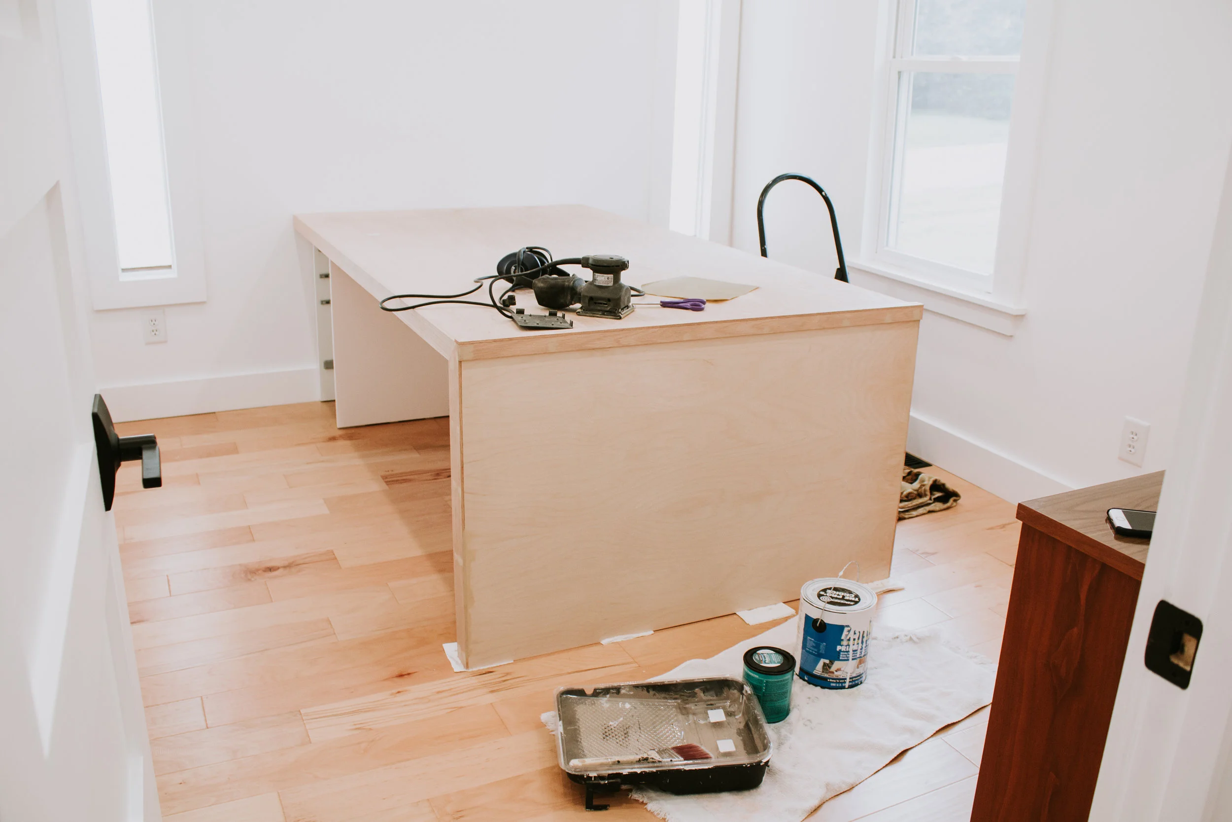 Waterfall desk made with leftover 2x4’s and plywood