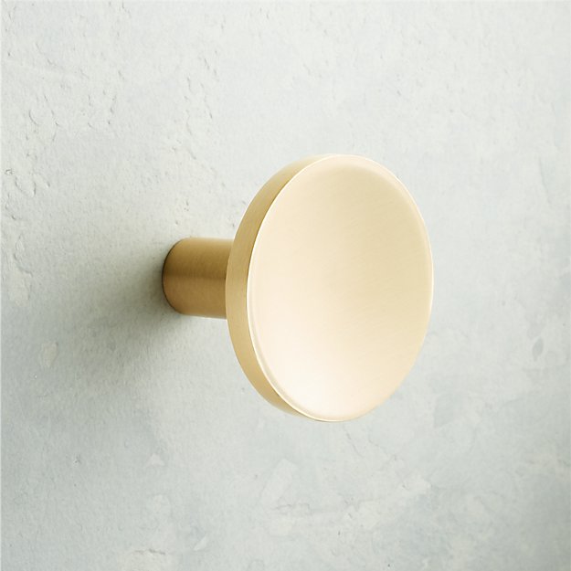 The High/Low List by Nadine Stay - Featuring Brass Accents. High end pieces and their (cheaper) twins. Brass home decor, furniture, and accessories. Brass circle knob from CB2.