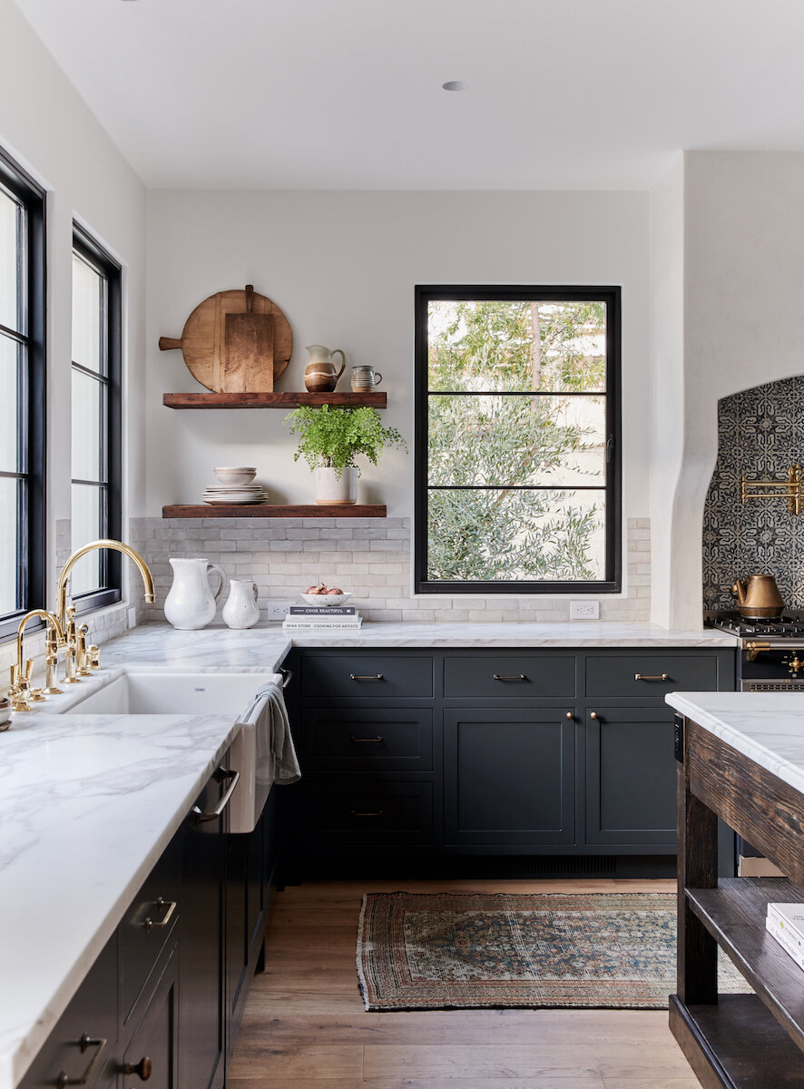 20 flush and semi-flush ceilings lights to replace your "boob lights." Black, brass, milk glass, and white ceiling light ideas and inspiration | Nadine Stay | Photo from Amber Interiors + Tessa Neustadt