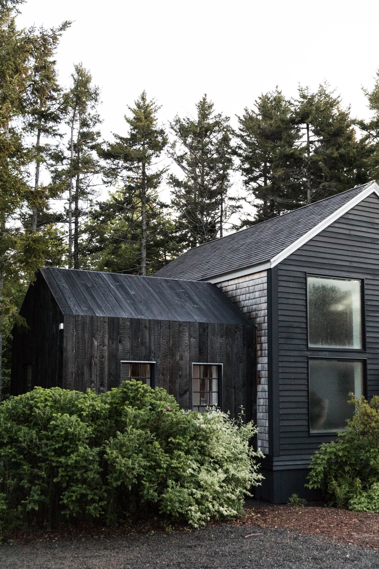 Exterior Update: Siding Inspiration, our game plan, and color scheme ideas - Nadine Stay | Board and batten vertical siding and weathered gray cedar shake shingle siding. | Photo Source: Gardenista