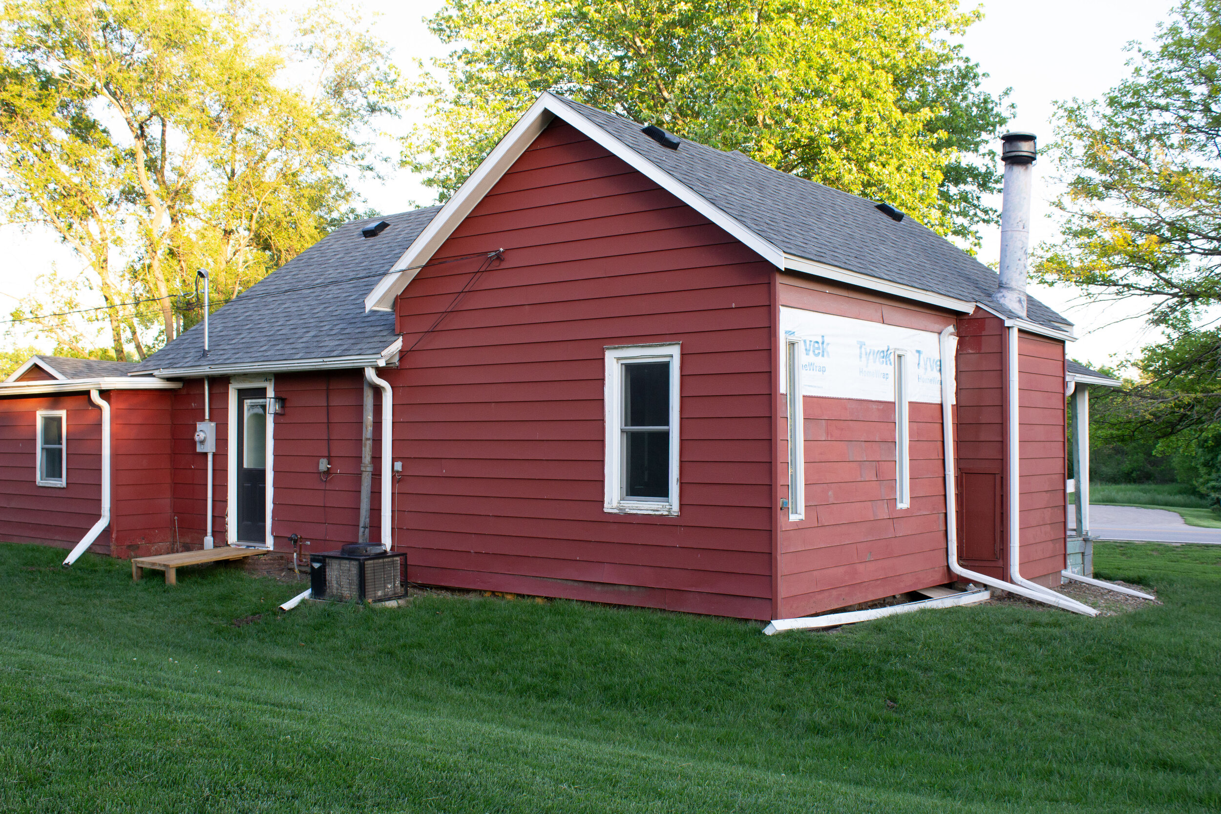 Exterior Update: Siding Inspiration, our game plan, and color scheme ideas - Nadine Stay | Board and batten vertical siding and weathered gray cedar shake shingle siding.