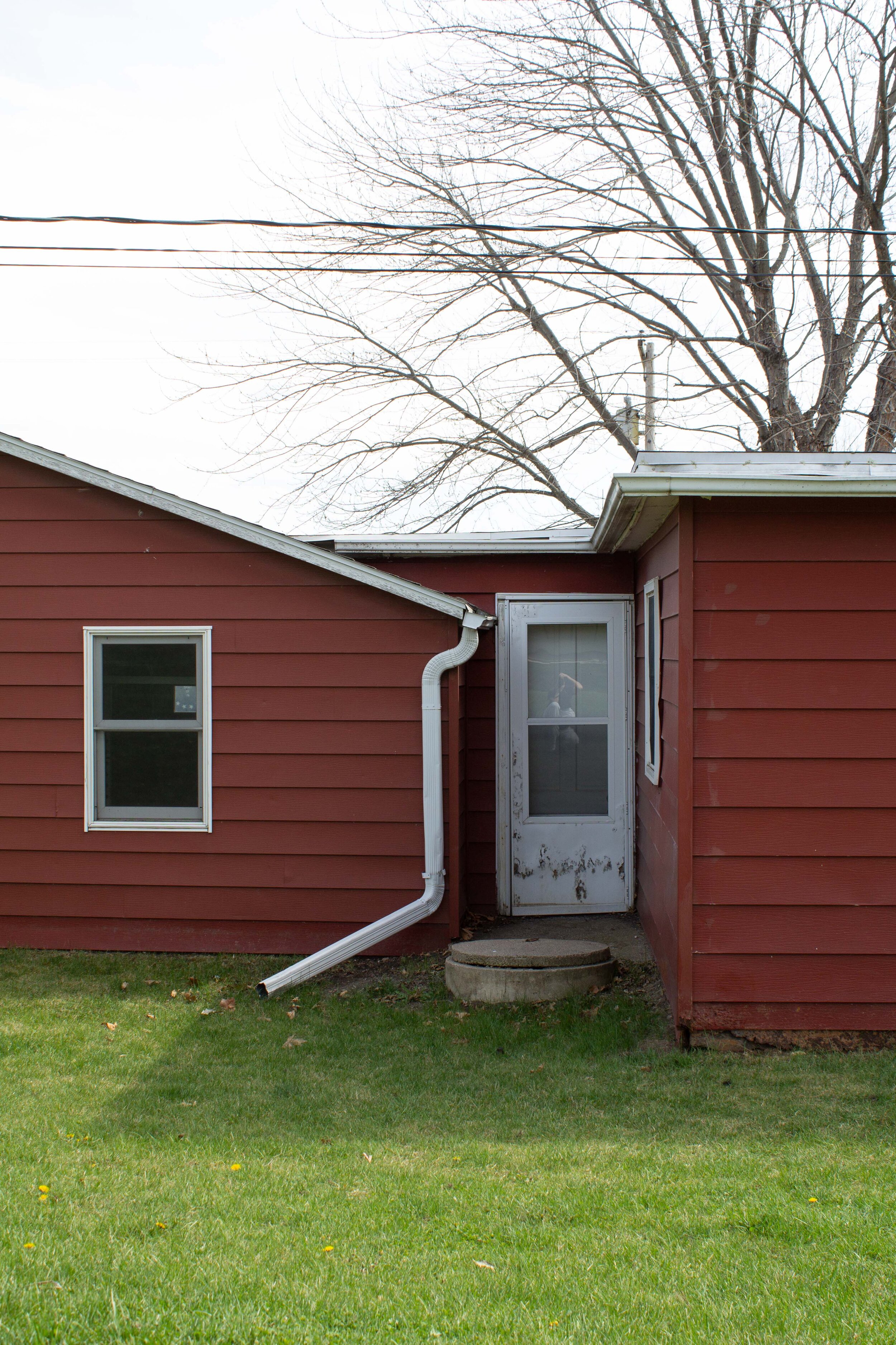 Exterior Update: Swapping a door for a window in the passthrough. Exterior window and cedar shake plans. | Nadine Stay