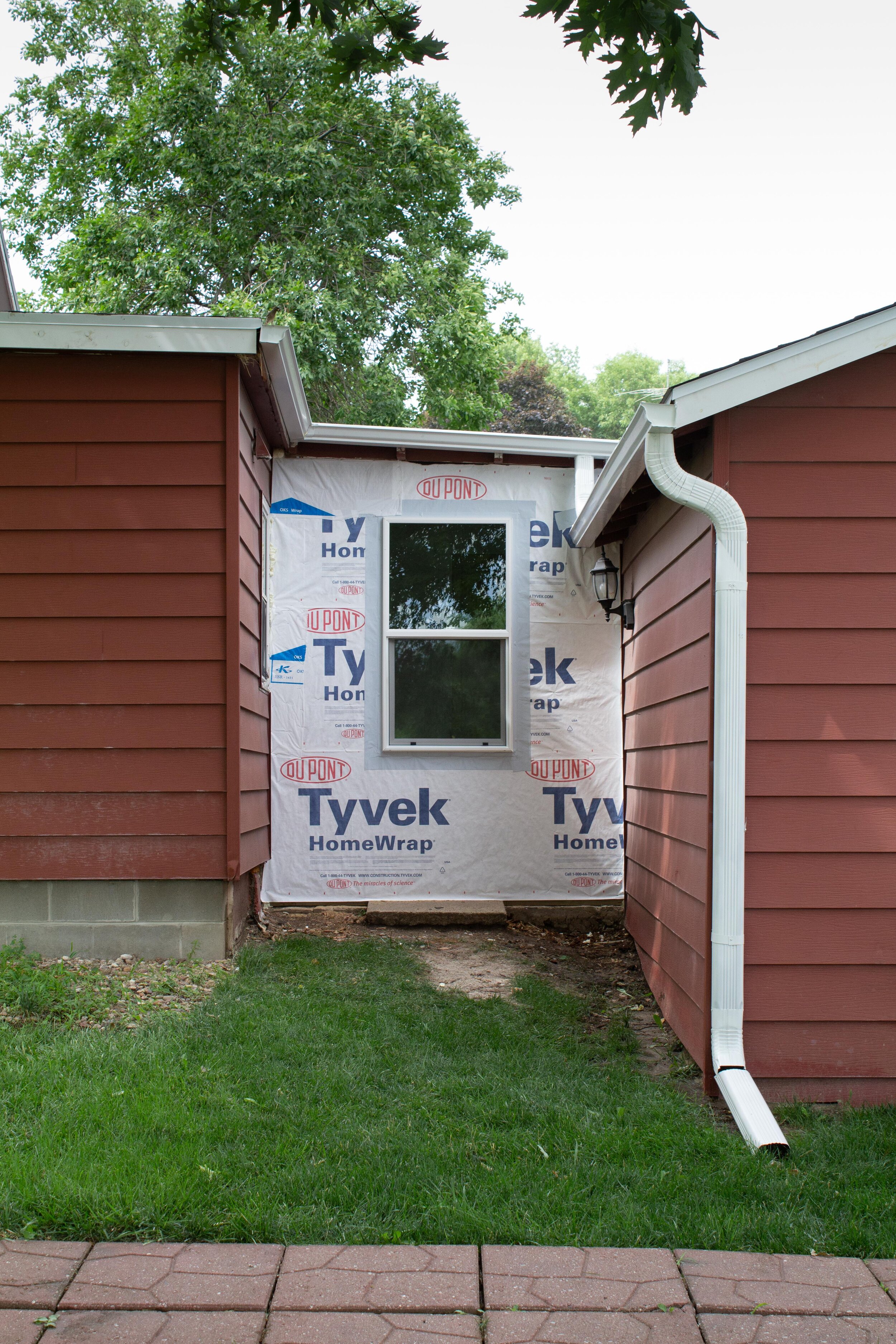 Exterior Update: Swapping a door for a window in the passthrough. Exterior window and cedar shake plans. | Nadine Stay